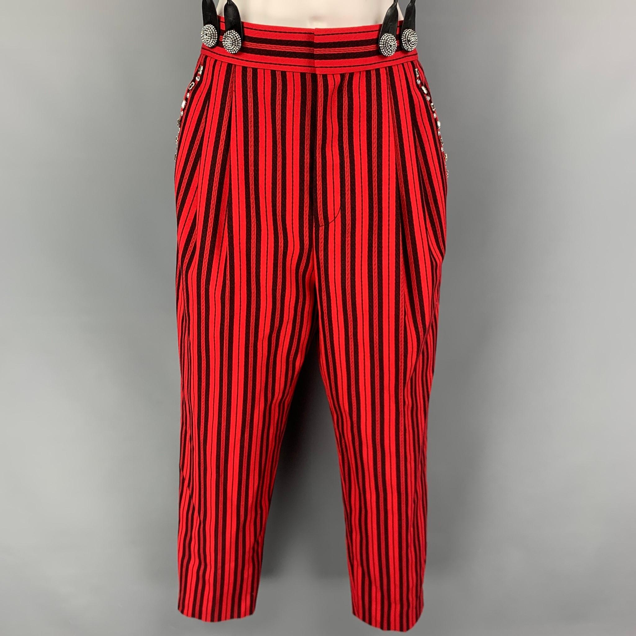 MARC JACOBS dress pants comes in a red & black stripe wool featuring a pleated style, crystal embellishments, suspenders, front tab, and a zip fly closure. Made in USA. 

Excellent Pre-Owned Condition.
Marked: 6

Measurements:

Waist: 30 in.
Rise: