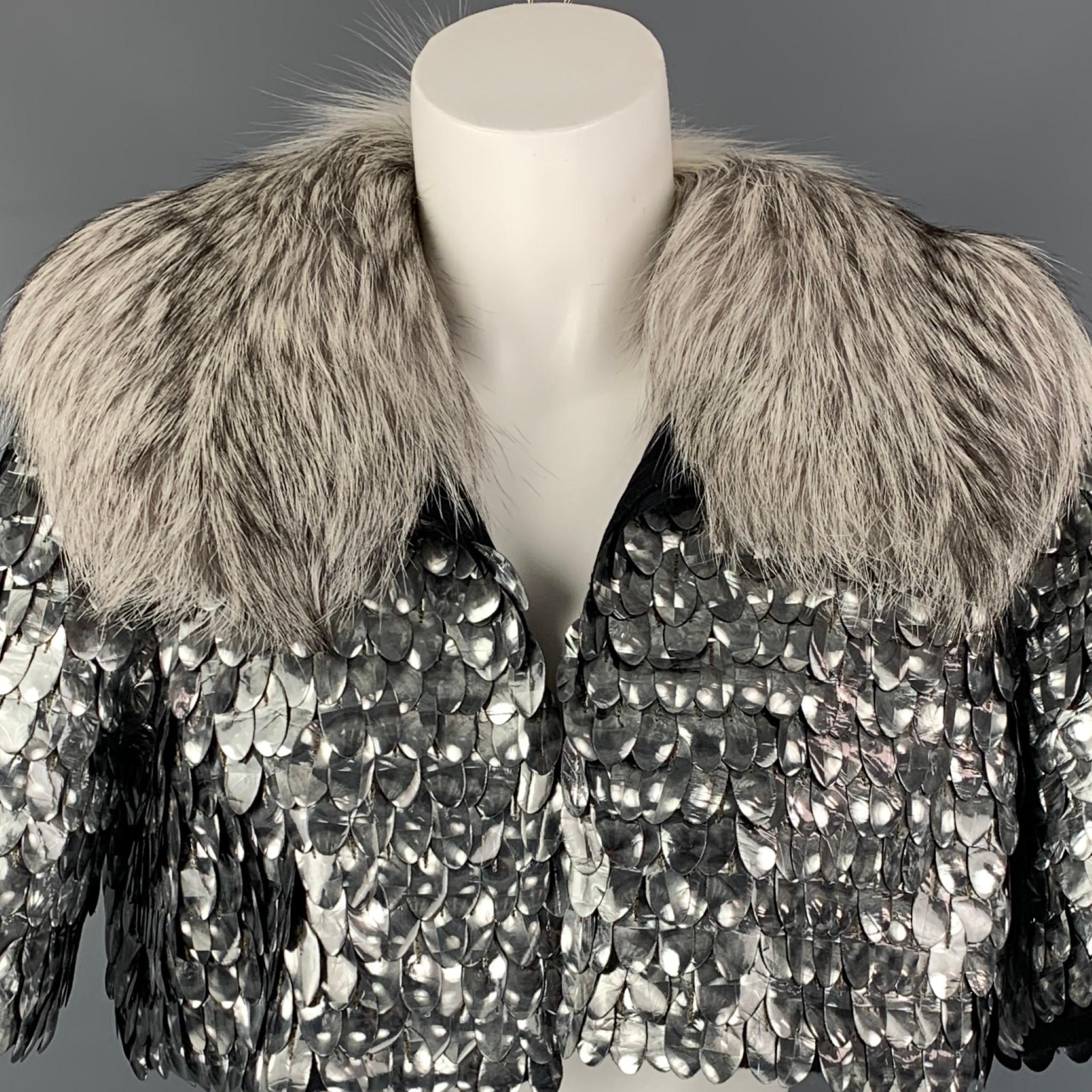 MARC JACOBS jacket comes in a silver & black embellished wool blend with a full liner featuring a cropped style, fox fur collar, and a open front. 

New With Tags. 
Marked: 6

Measurements:

Shoulder: 15 in.
Bust: 38 in.
Sleeve: 11 in.
Length: 14