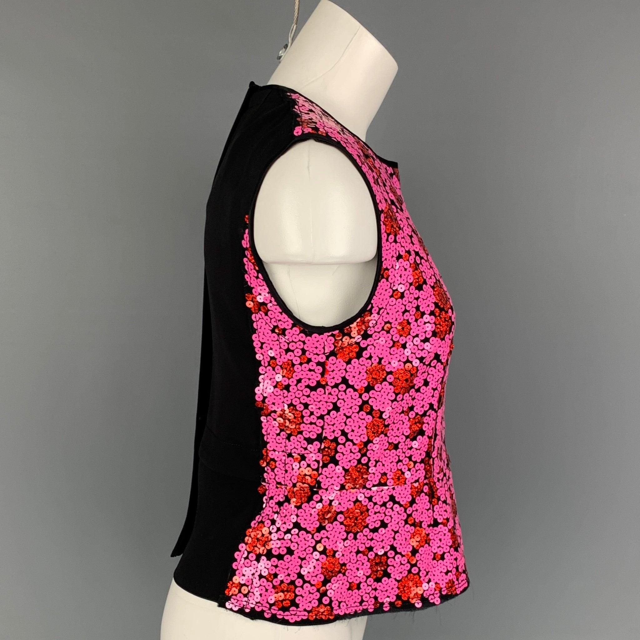 MARC JACOBS dress top comes in a pink & black sequin polyester featuring a back black panel, sleeveless, and a back zip up closure.
Very Good
Pre-Owned Condition. 

Marked:   4 

Measurements: 
 
Shoulder: 16 inches  Bust:
34 inches  Length: 20