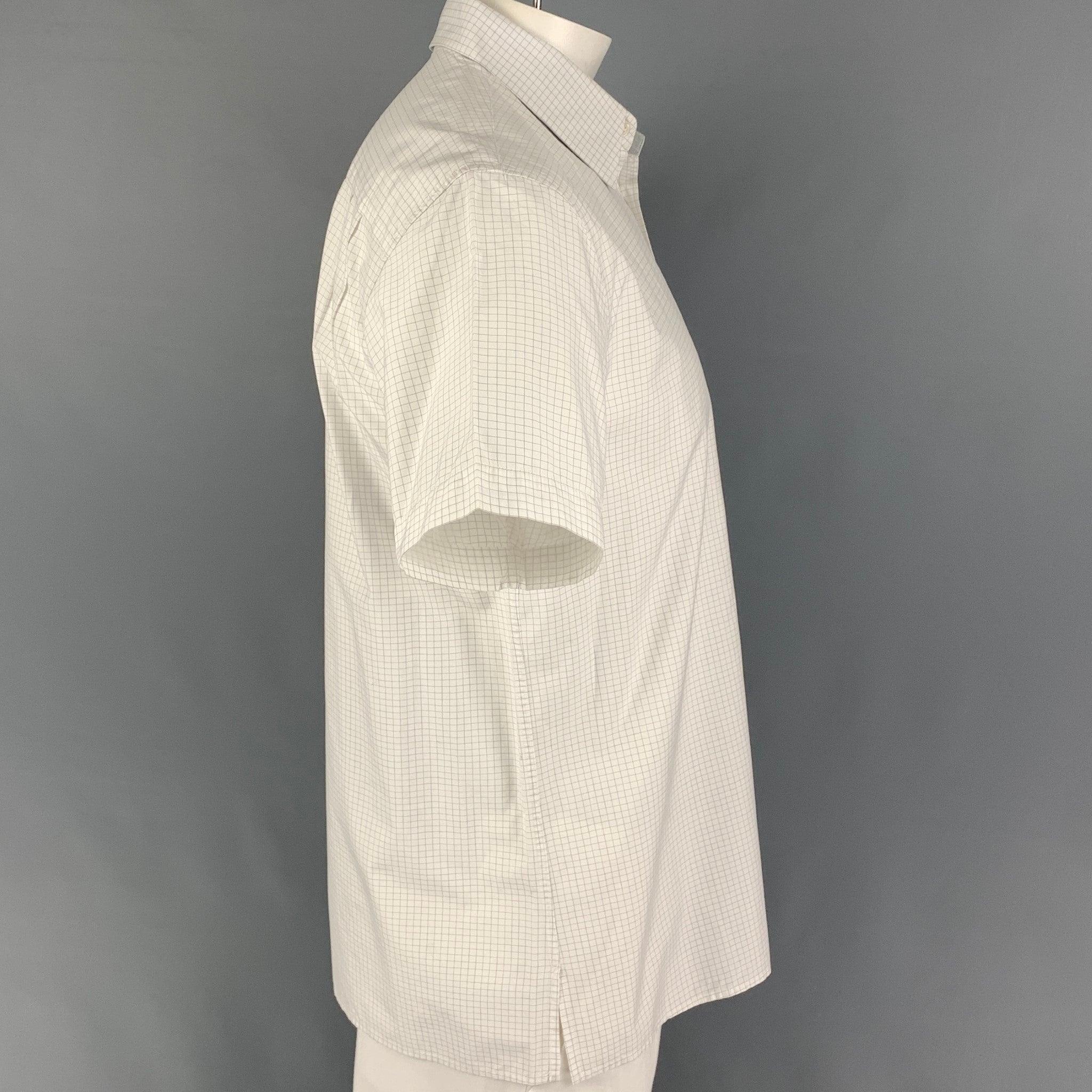 MARC JACOBS short sleeve shirt comes in a white grid print cotton featuring a spread collar, patch pocket, and a button up closure. Made in Italy.
 Good
 Pre-Owned Condition. Light discoloration at front. As-is.  
 

 Marked:  50 
 

 Measurements: