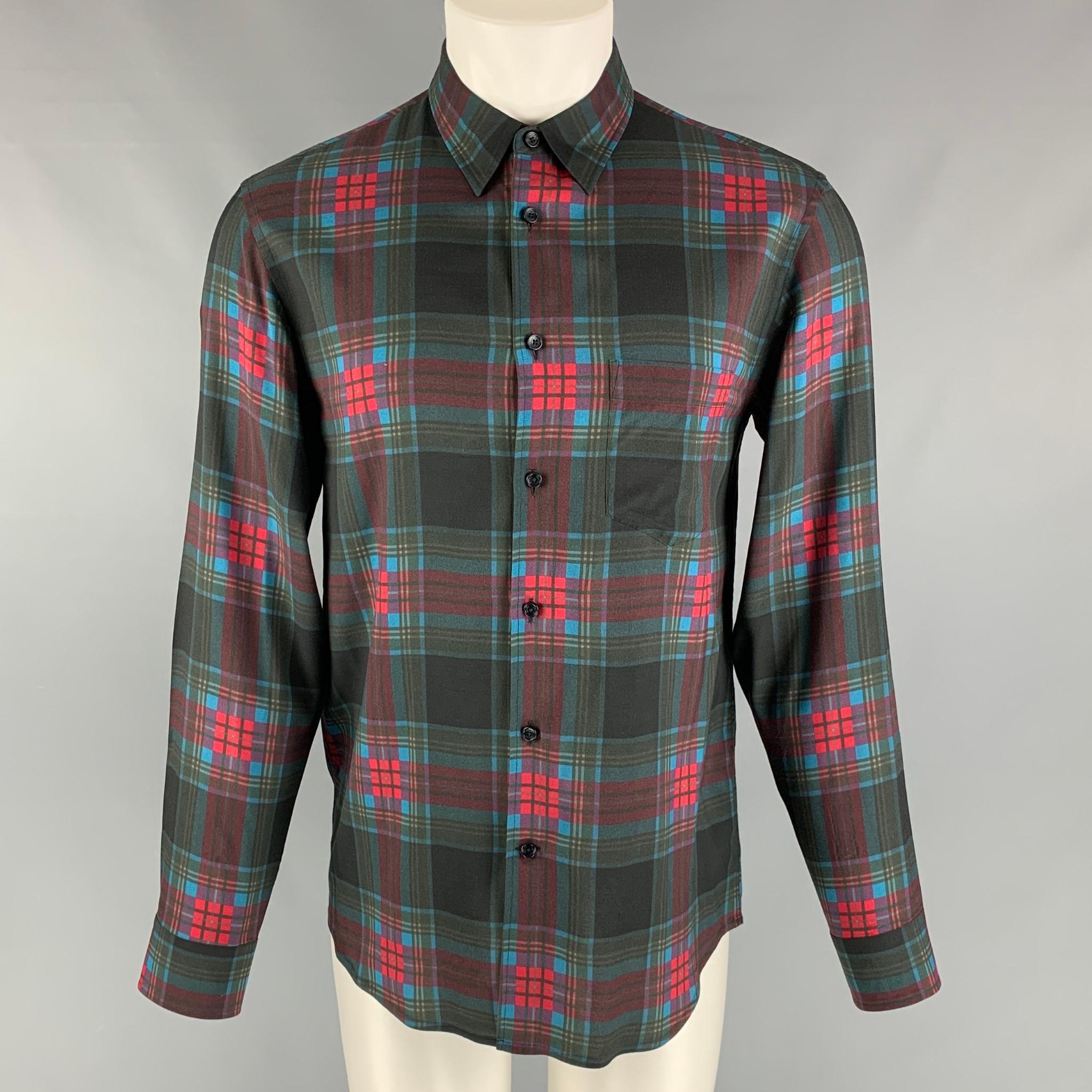 MARC JACOBS long sleeve shirt comes in black multi-color plaid viscose featuring a straight collar, frontal pocket, and buttons closure. Made in Italy.
 
Excellent Pre-Owned Condition.
Marked: 48

Measurements:

Shoulder: 18 in.
Chest: 41
