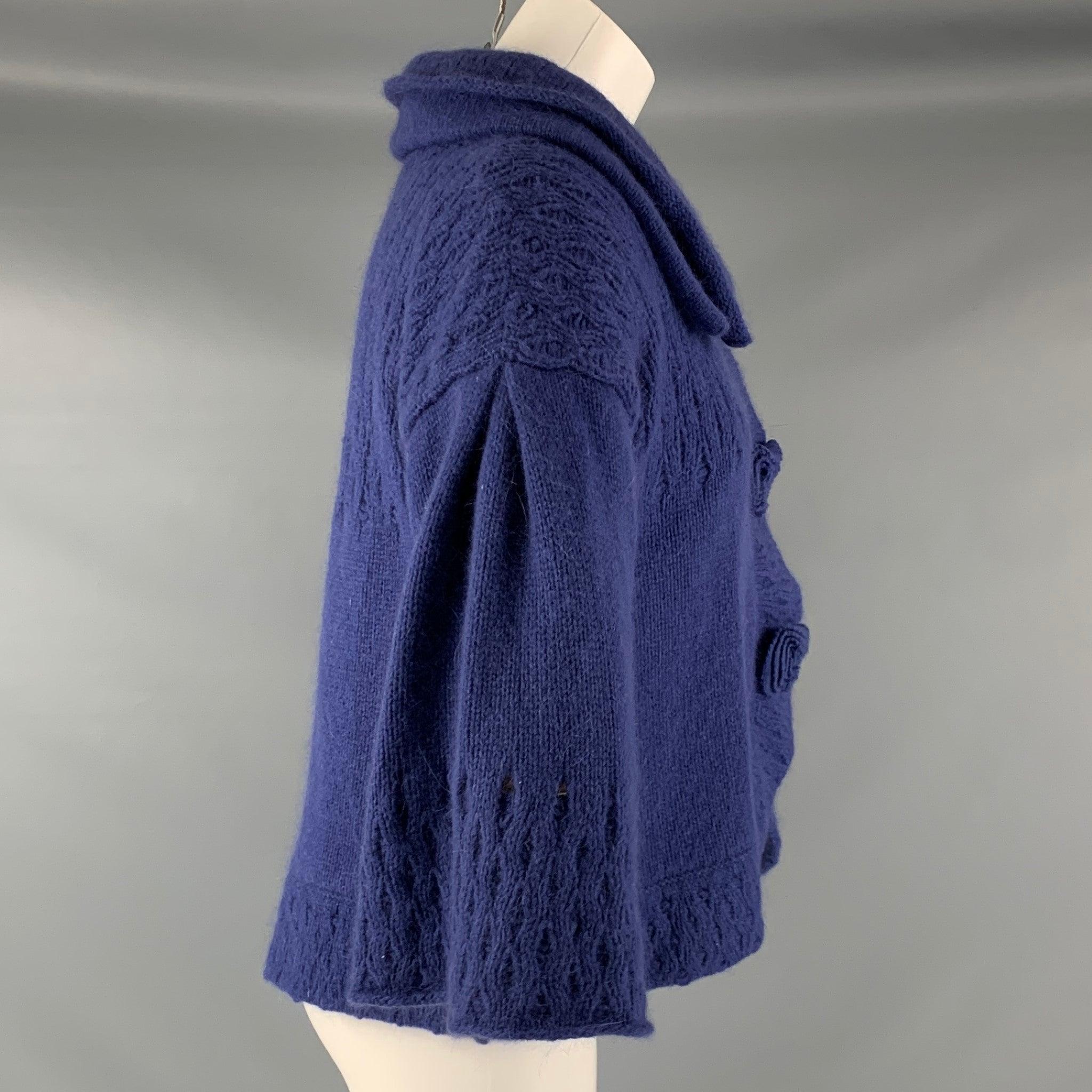 MARC JACOBS jacket comes in a blue lambswool and Angora Knit featuring a heather grey lining, A-line style, large lapel, 3/4 sleeves, and a snap button closure. Very Good Pre-Owned Condition. Minor signs of wear. 

Marked:   S 

Measurements: 

