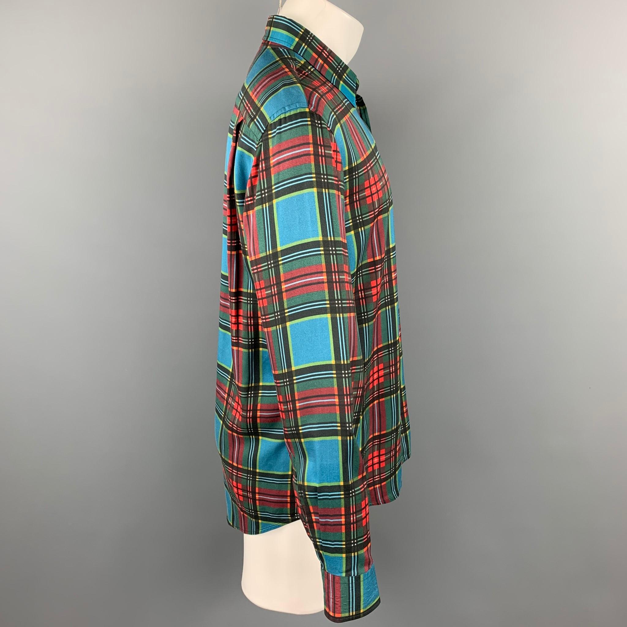 MARC JACOBS long sleeve shirt comes in a multi-color plaid viscose featuring a classic fit, button up style, front pocket, and a spread collar. Made in Italy.

Excellent Pre-Owned Condition.
Marked: IT 48

Measurements:

Shoulder: 19 in.
Chest: 42