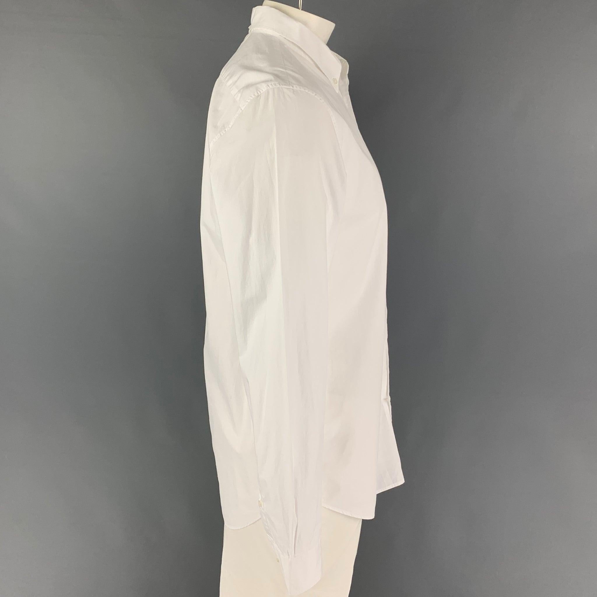 MARC JACOBS long sleeve shirt comes in a white cotton featuring a classic style, button down collar, and a button up closure. Made in Italy.
Good
Pre-Owned Condition. Small mark at front. As-Is.  

Marked:   54 

Measurements: 
 
Shoulder: 19 inches
