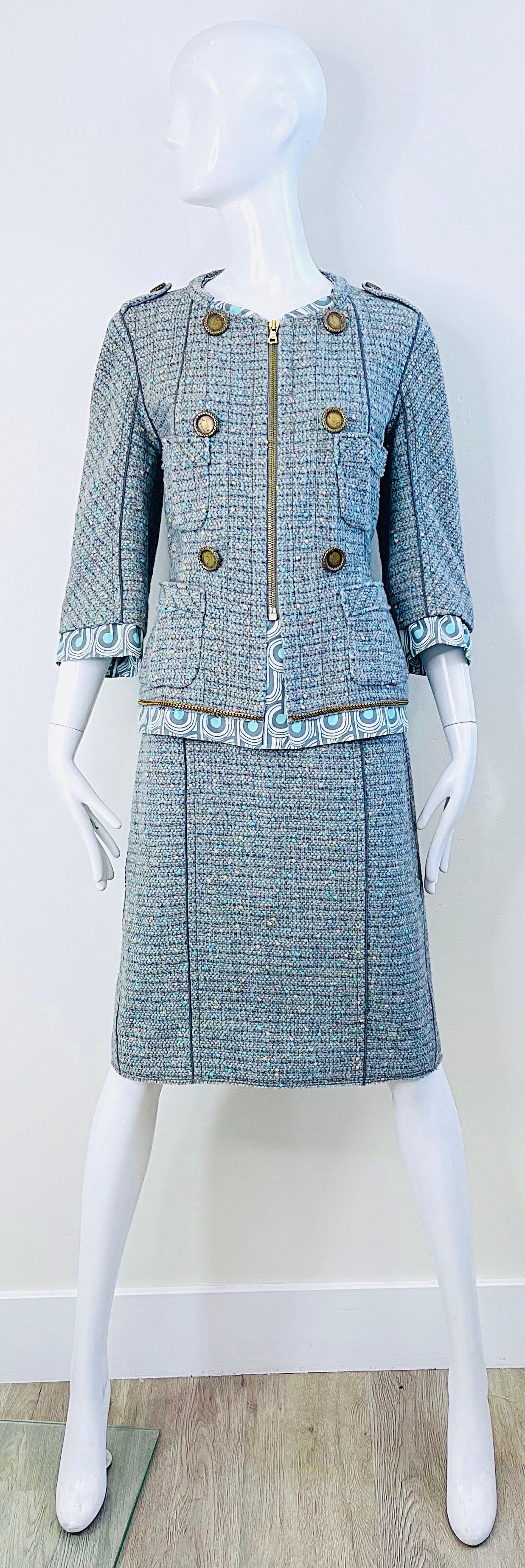 Chic MARC JACOBS Spring 2005 60s style blue and green skirt suit ! Soft wool and nylon blend that is completely lined. Silk details at sleeves, waist and neck. Full gold zipper up the front. Mock golden brass buttons on each side with pockets.