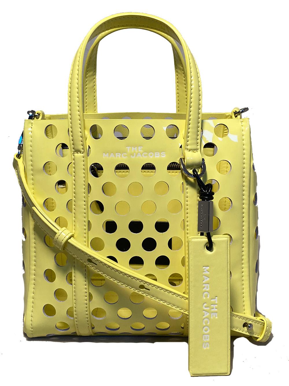 Marc Jacobs The Tag 21 Perforated Leather Tote in New With Tags condition. never used. Unique perforated holey neon yellow patent leather with multiple accessories including a removable multi tonal metal chain shoulder strap, matching removable