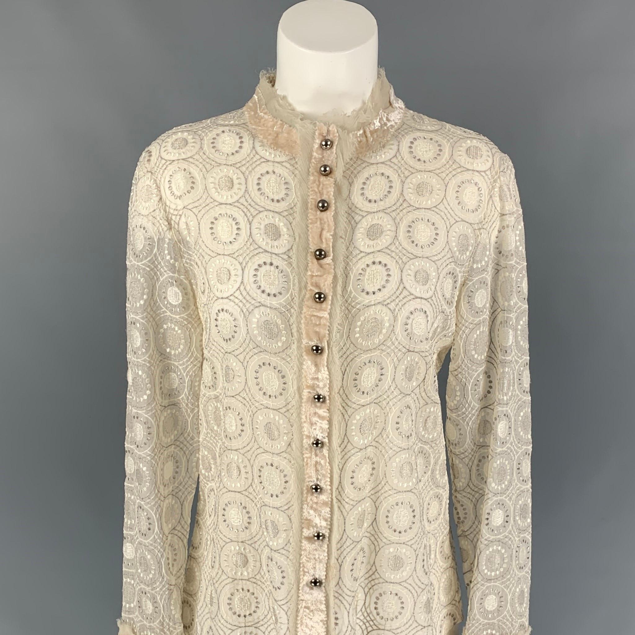 MARC JACOBS x BERGDORF GOODMAN blouse comes in a beige silk featuring metallic embroidery, raw edge, silver tone buttons, and a snap button closure. Made in USA. 

Very Good Pre-Owned Condition.
Marked: 6

Measurements:

Shoulder: 16.5 in.
Bust: 36