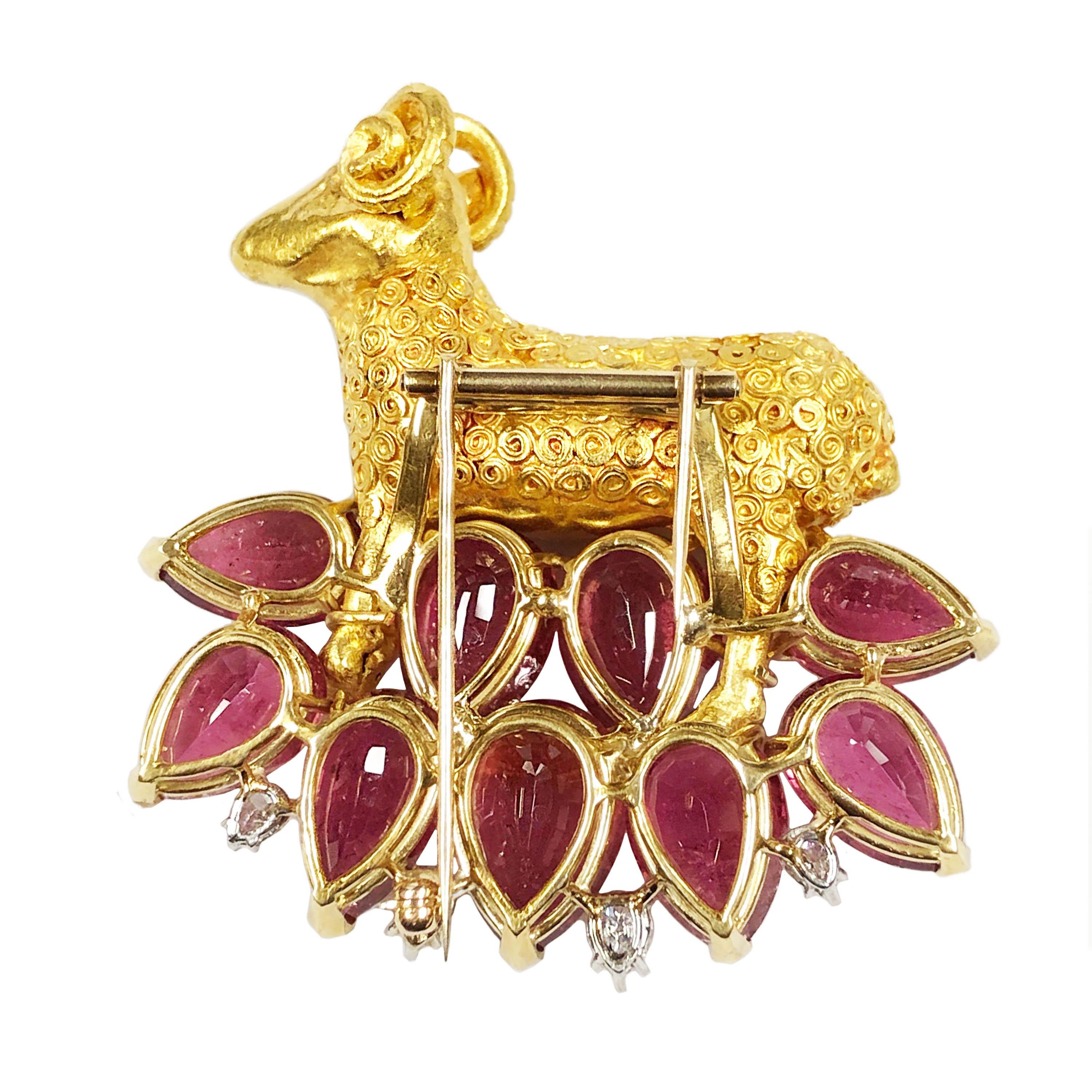 Circa 1960s Marc Koven very large,  Ram of Abraham and Impressive 18K Yellow Gold brooch in the Form of a Ram, the detailed and textured 2 sided Ram measures 1 3/4 X 15/8 inch and is set atop of 10 Pear Shape Pinkish Red Rubelites that range in size