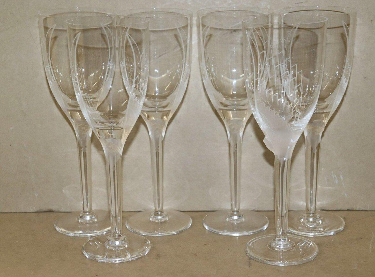20ième siècle Marc Lalique : douze flûtes à champagne « Ange » en cristal en vente