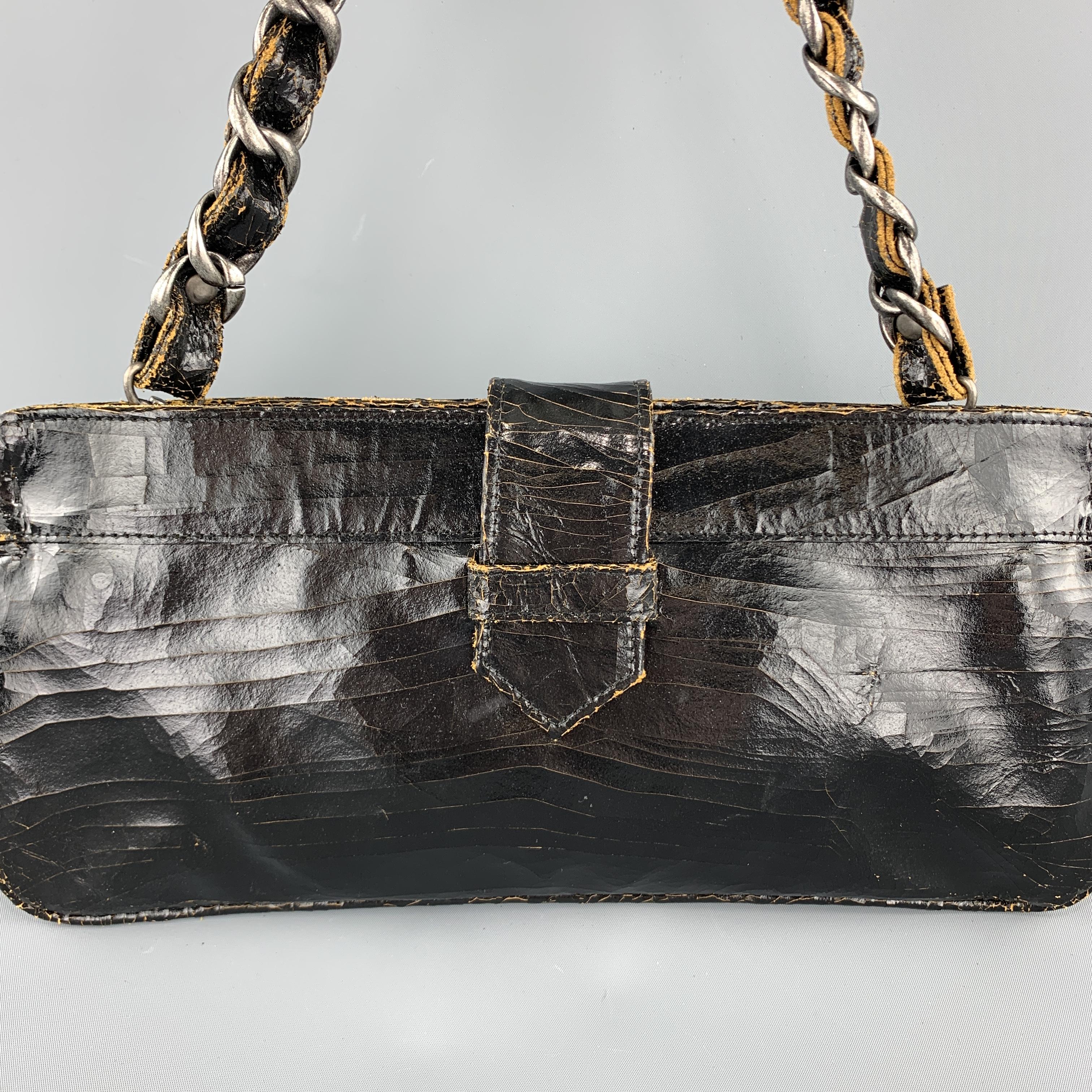 MARC MARMEL bag comes in tan leather with all over crackle distressed black glossy coating with magnetic top closure, flap strap, and detachable woven chain shoulder strap. Made in USA. 

Excellent Pre-Owned Condition.

Measurements:

Length: 13