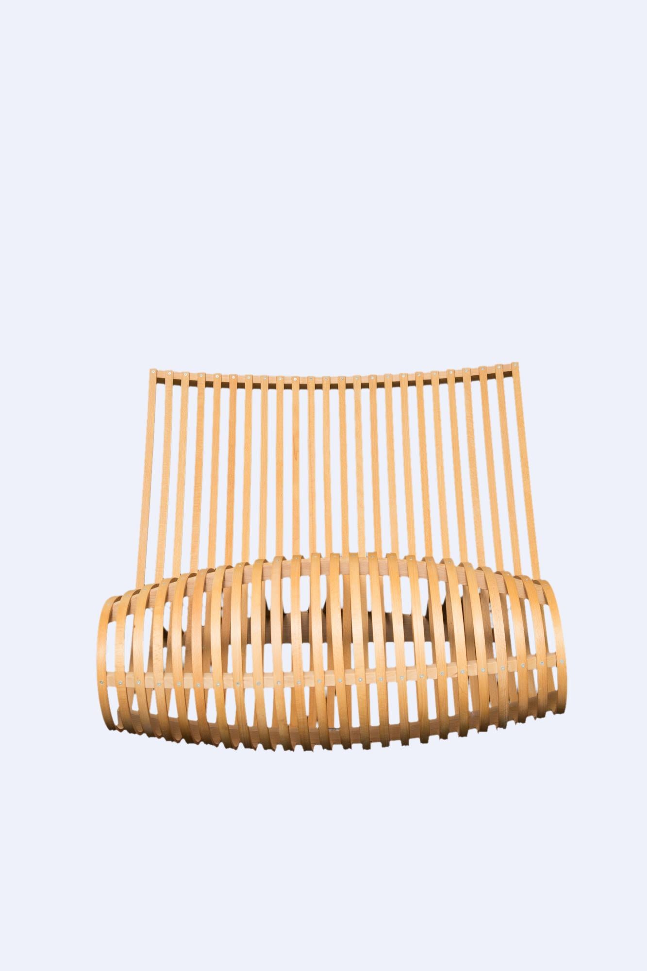 Designer Marc Newson, 1990s natural beech heartwood, oil-finished made in Italy by Cappellini wooden chair is a sculptural art piece. The beautiful lines of the bentwood of sturdy natural beech heartwood provide all the support necessary to stay and