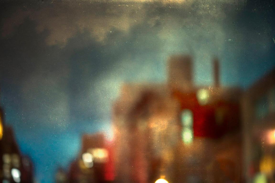 Color Photograph Marc Yankus - Coming to Town (venir en ville)