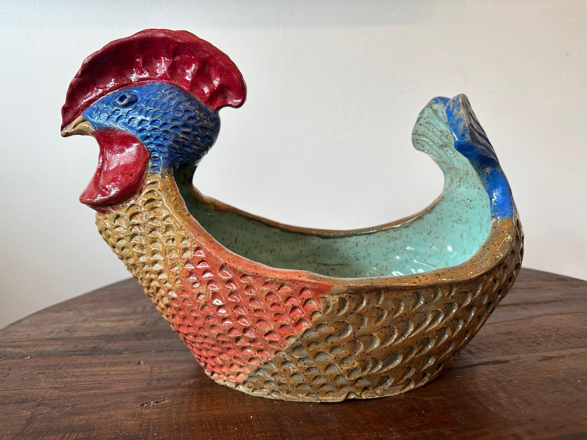 Functional Art Sculpture one of a kind by Marc Zimmerman

Chicken Bowl - Rooster - Clay Sculpture

This whimsical clay sculpture, created by the talented artist Marc Zimmerman, stands out as a one-of-a-kind masterpiece. Zimmerman's remarkable Clay