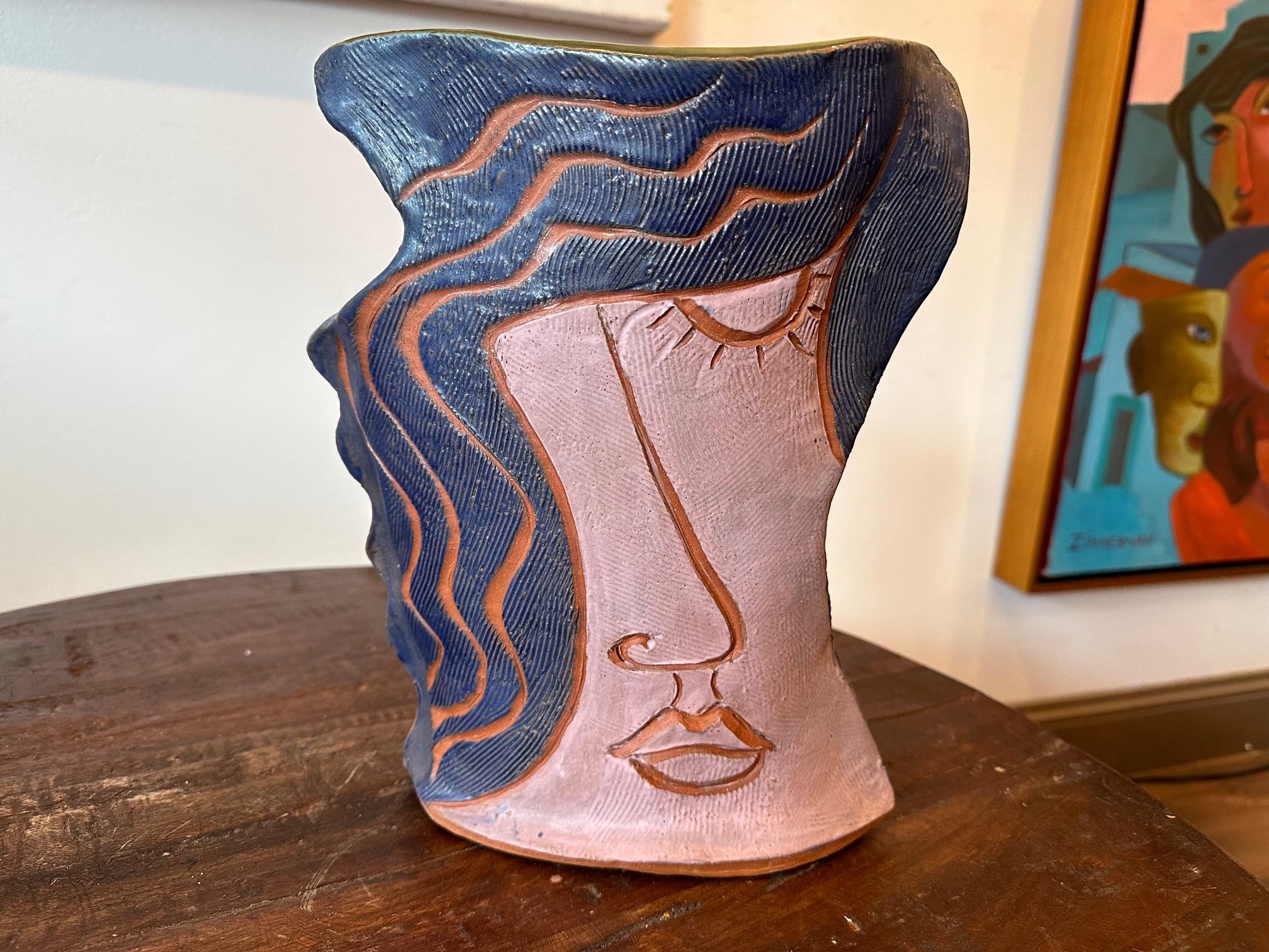 Functional Art Sculpture one of a kind by Marc Zimmerman

Figurative Vase - face - Clay Sculpture

This whimsical clay sculpture, created by the talented artist Marc Zimmerman, stands out as a one-of-a-kind masterpiece. Zimmerman's remarkable Clay