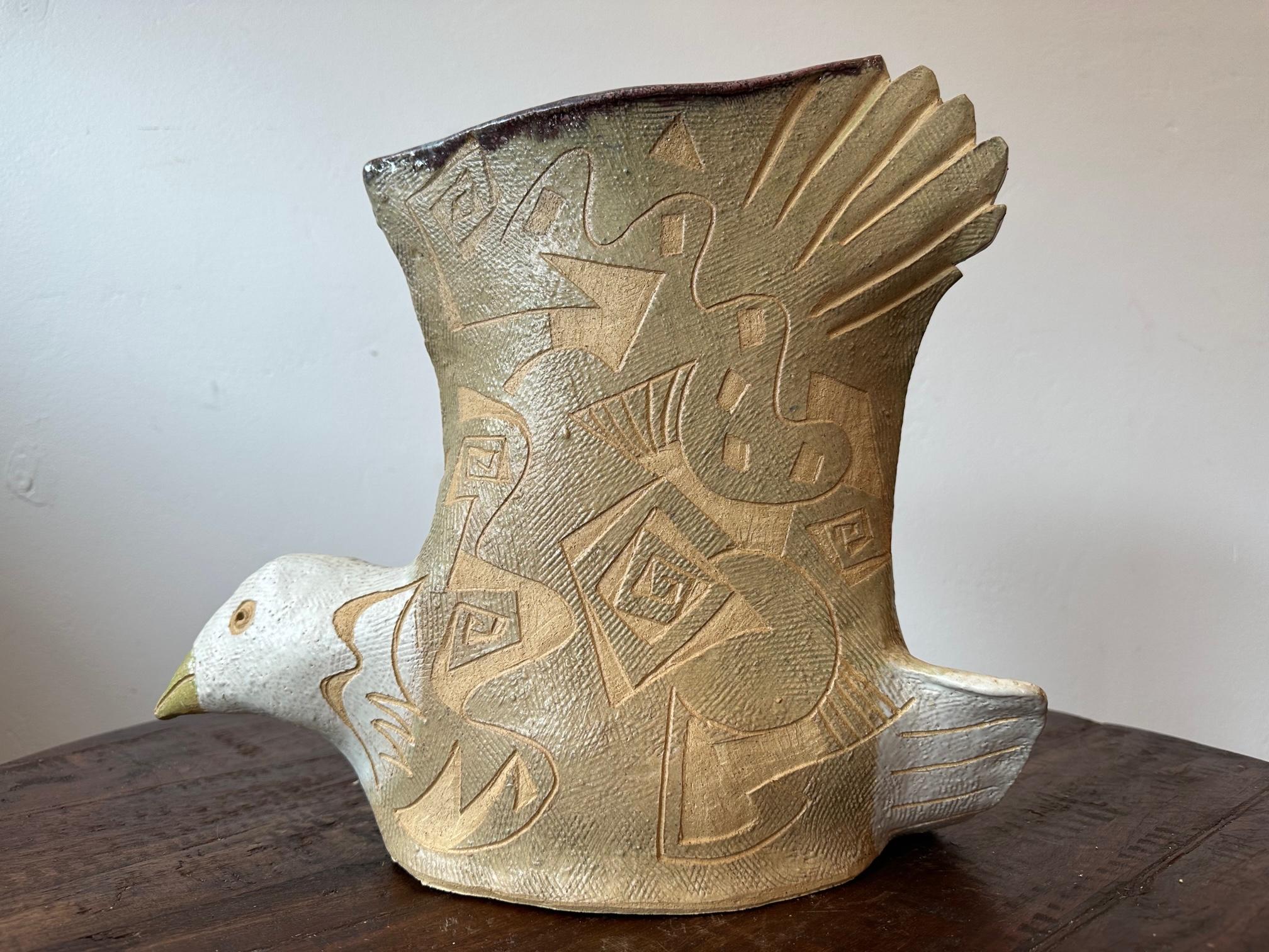Functional Art Sculpture one of a kind by Marc Zimmerman

Freedom Bird Vase  - Clay Sculpture 

This whimsical clay sculpture, created by the talented artist Marc Zimmerman, stands out as a one-of-a-kind masterpiece. Zimmerman's remarkable Clay