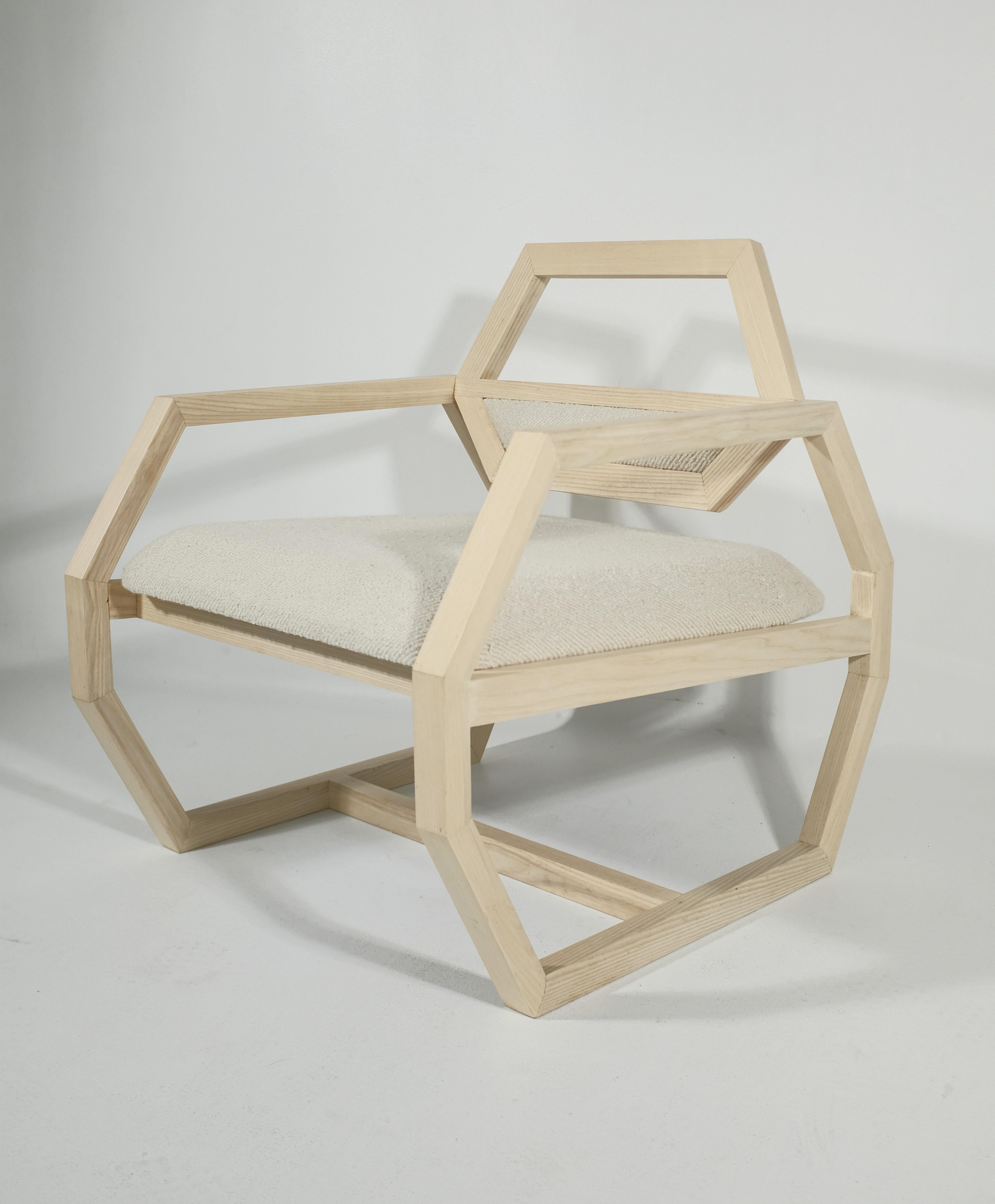 The Marcel Accent chair is a Futuristic, bold, and comfortable chair, inspired by organic hexagon shape. The chair is named after Nathan's late dog Marcel (Maltese). Marcel Accent chair will stand out in any room, its slightly wider seat allows