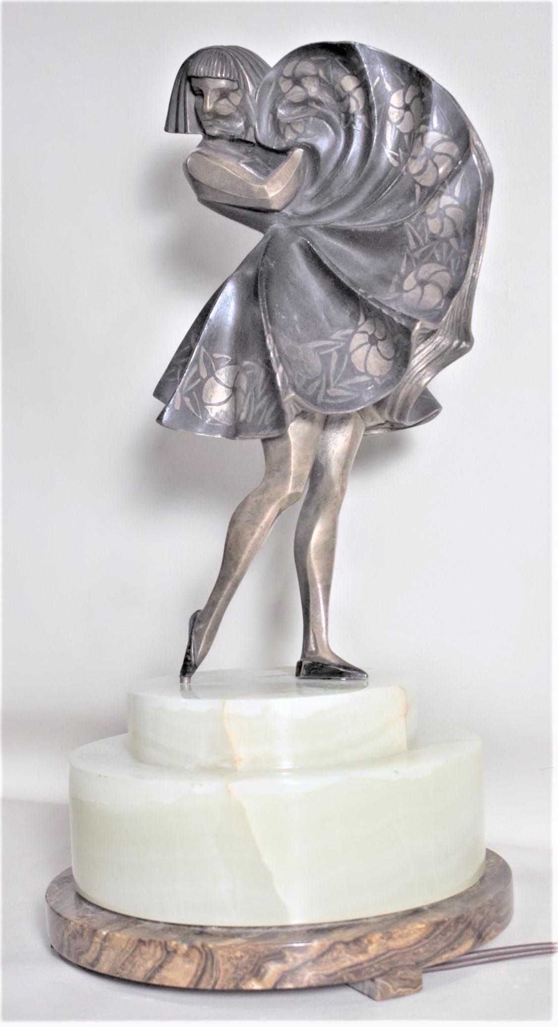 Marcel Andre Bouraine, versilberte Bronzeskulptur eines tanzenden Mädchens, Art déco, beleuchtete Skulptur (Gegossen) im Angebot