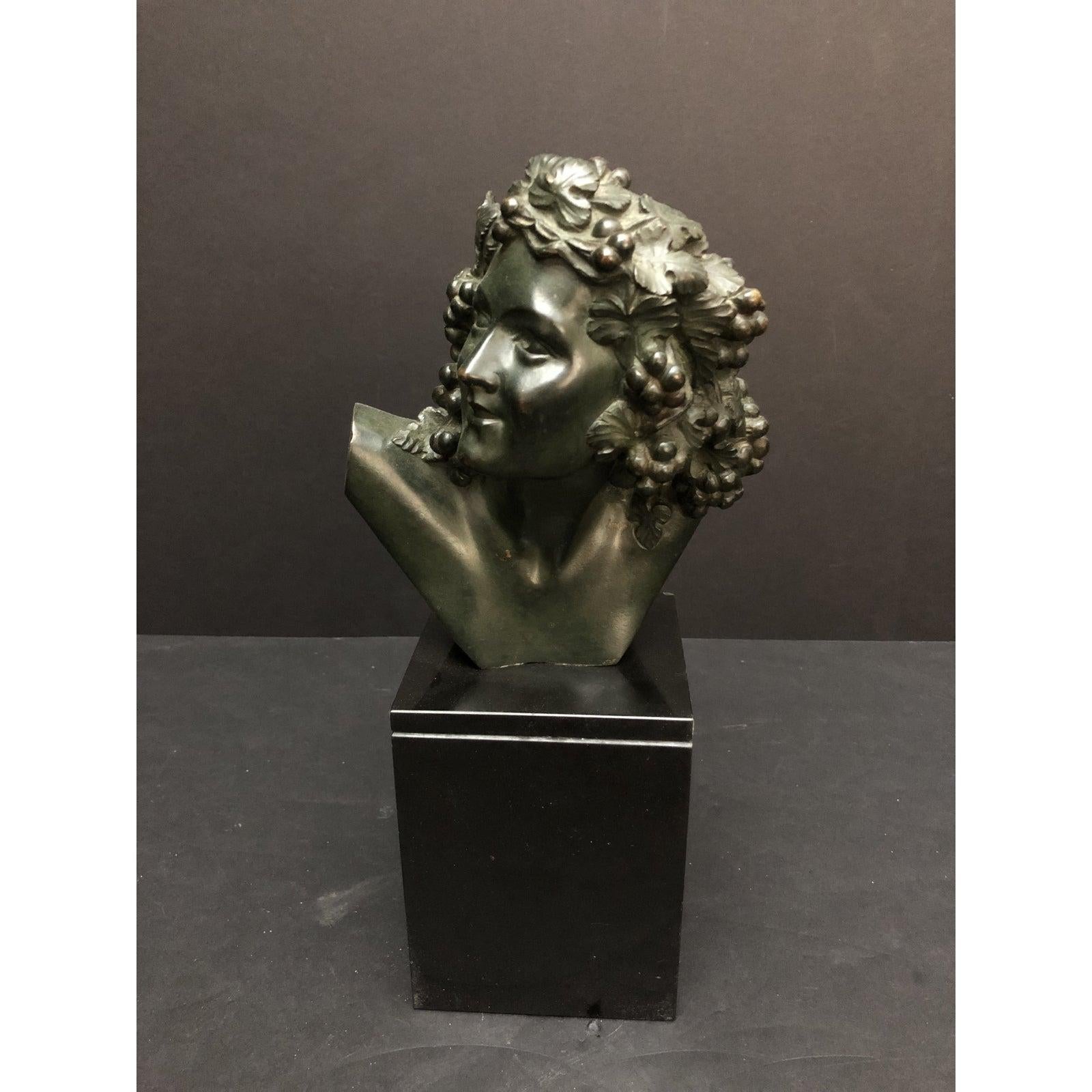 Marcel-André Bouraine (1886-1948) Bronze Bust Sculpture. Fine quality period Art Deco bronze bust by celebrated sculptor Marcel-André Bouraine. Mounted on an original Belgium black marble base. Beautifully sculpted female with hair dressed with