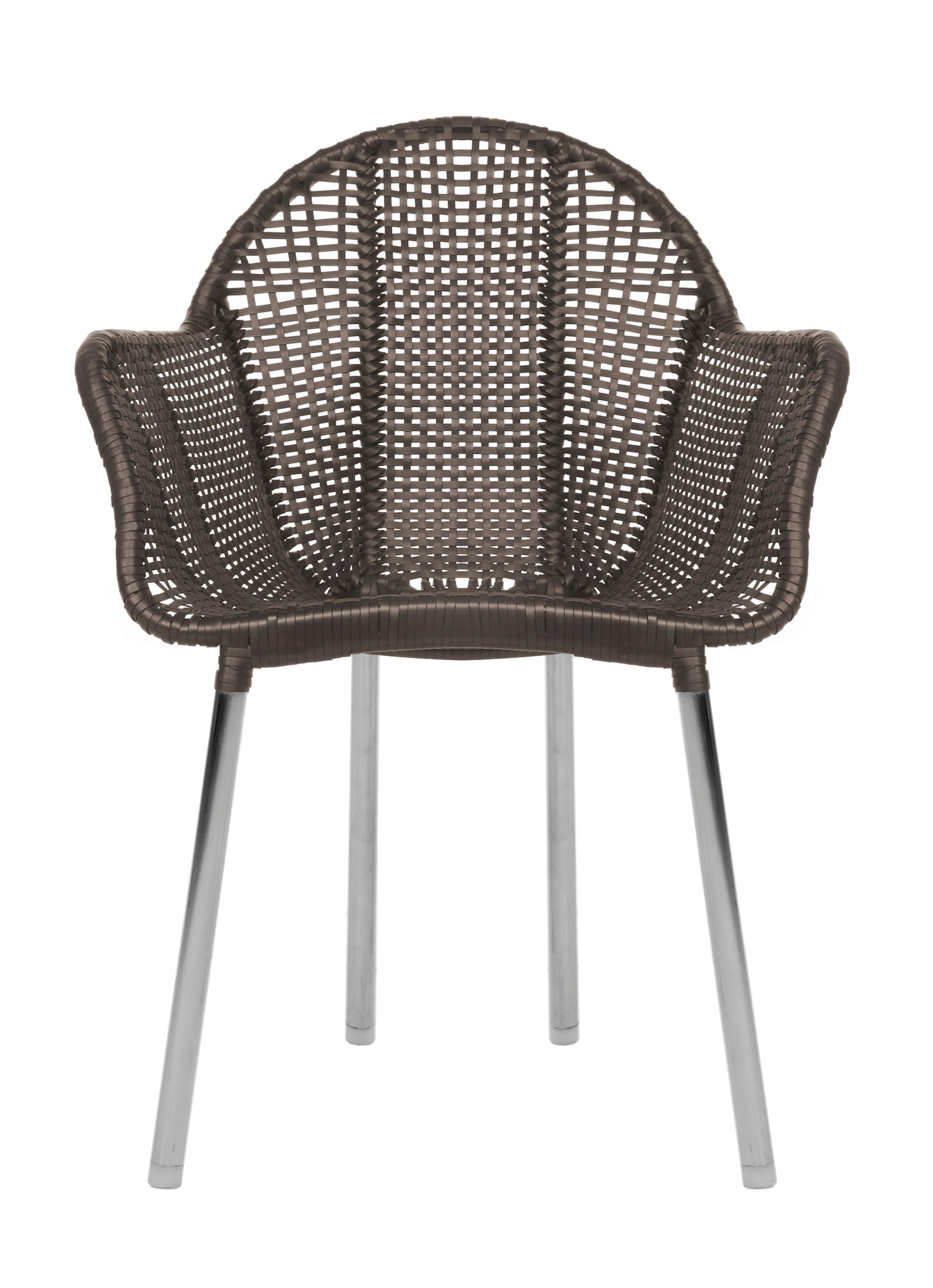Marcel armchair by Kenneth Cobonpue.
Materials: Polyethelene, stainless steel, aluminum. 
Also available in other colors.
Dimensions: 60cm x 62cm x H 82cm 

The Marcel collection complements any outdoor space with pieces that are made for