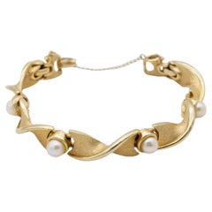 Marcel Boucher 1950s White Round Pearls Spiral Twist Link Tennis Gold Bracelet