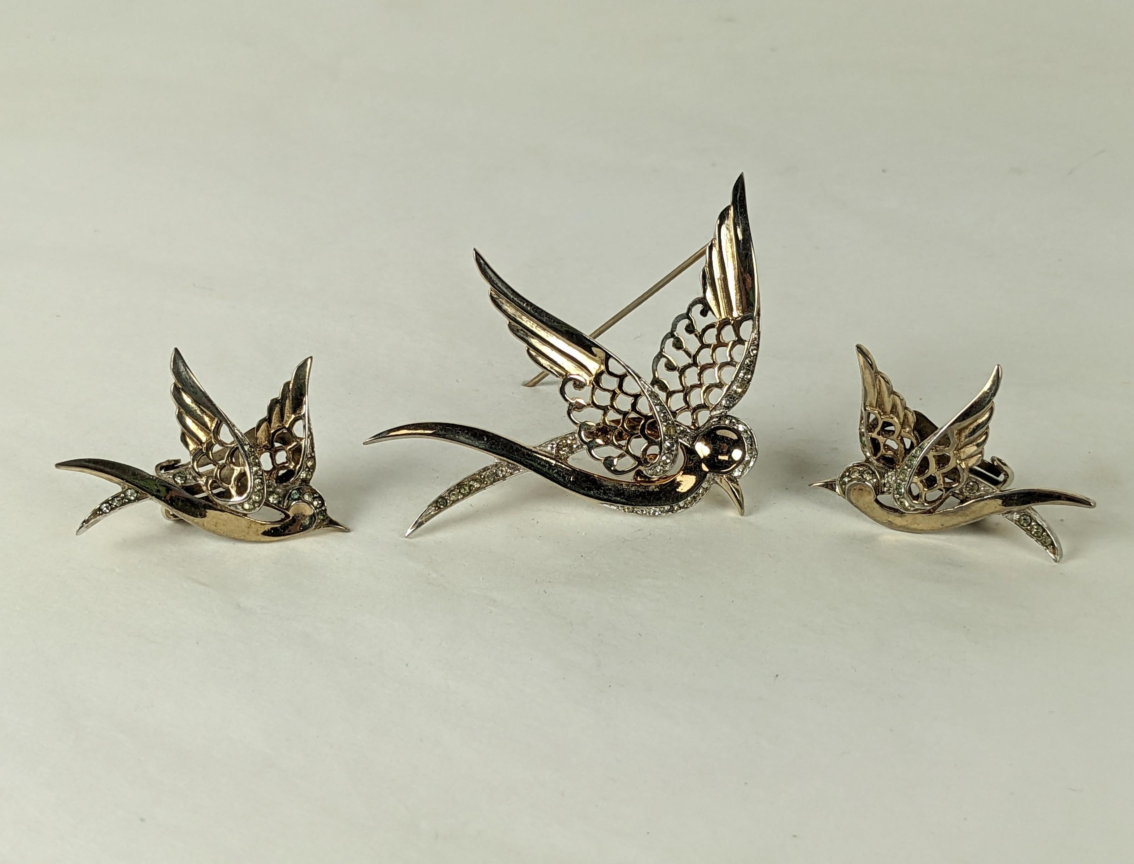 Lovely Marcel Boucher Art Deco Doves Suite from the 1930's. Early MB mark on pierced gold plated dove with pave accents and matching clip bird earrings in flight. 1930's USA. 
Bird length 2.5