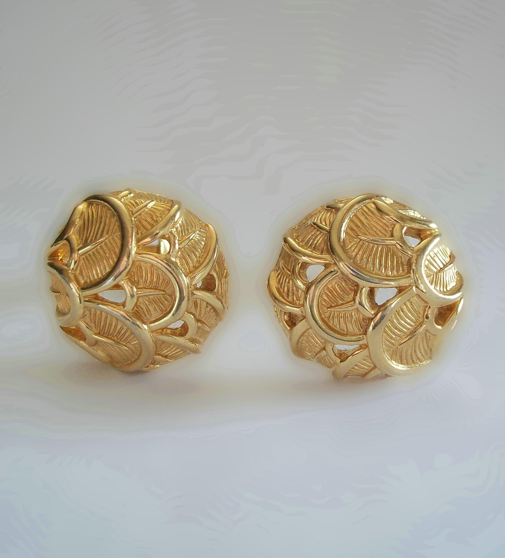 MARCEL BOUCHER - Art Deco style yellow gold tone round ear clips - each clip featuring stylized over-lapping palm leaves (a favorite Art Deco motif) with pierced elements - finest quality workmanship and detail that this brand is known for - lever