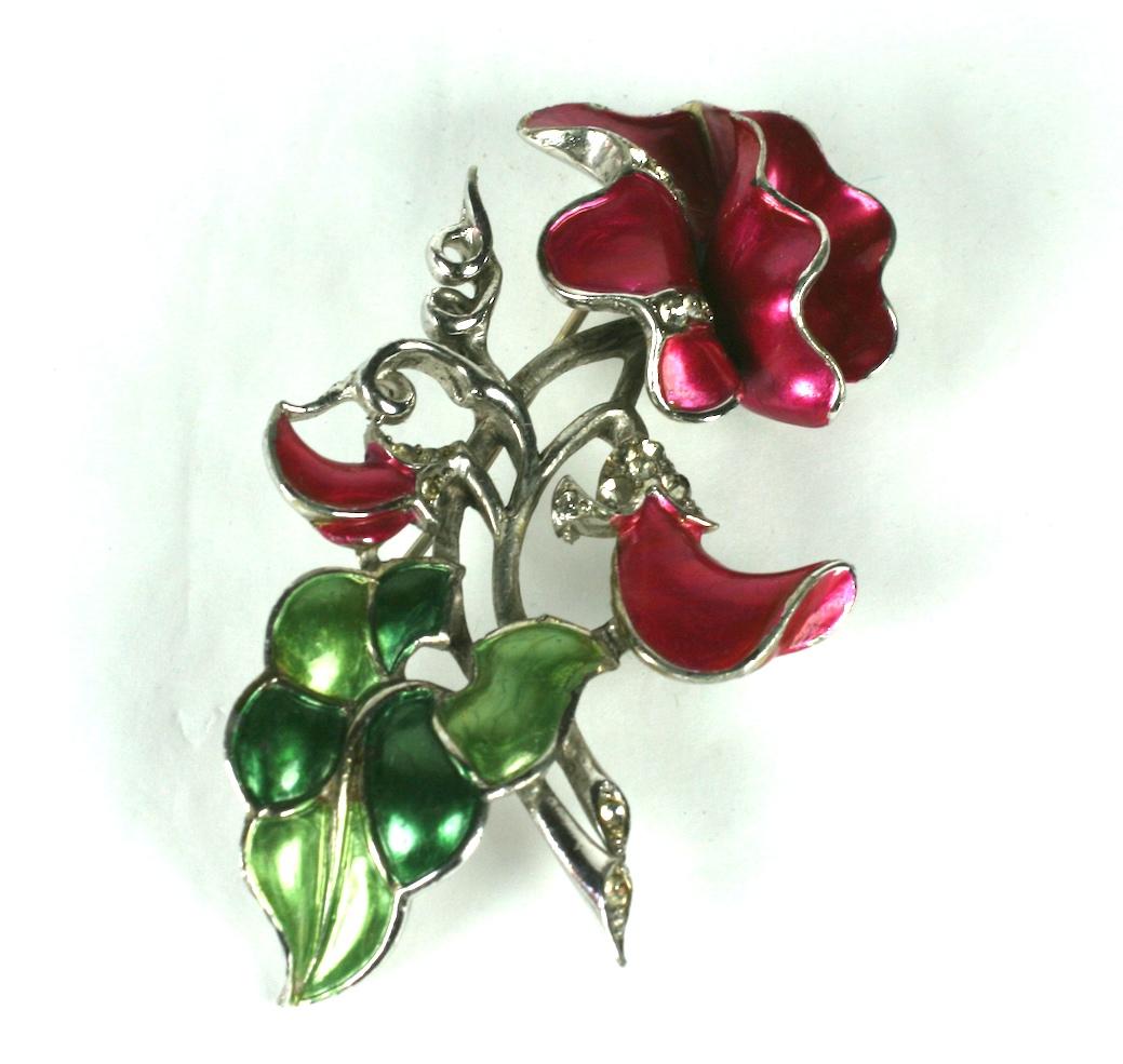  Marcel Boucher's rare sweet pea brooch with bright magenta/deep pink and varied shades of green pearlized enamel with crystal rhinestones accents.  Made of rhodium plated metal from Marcel Boucher's 1941 collectible, metallic enamel series.
