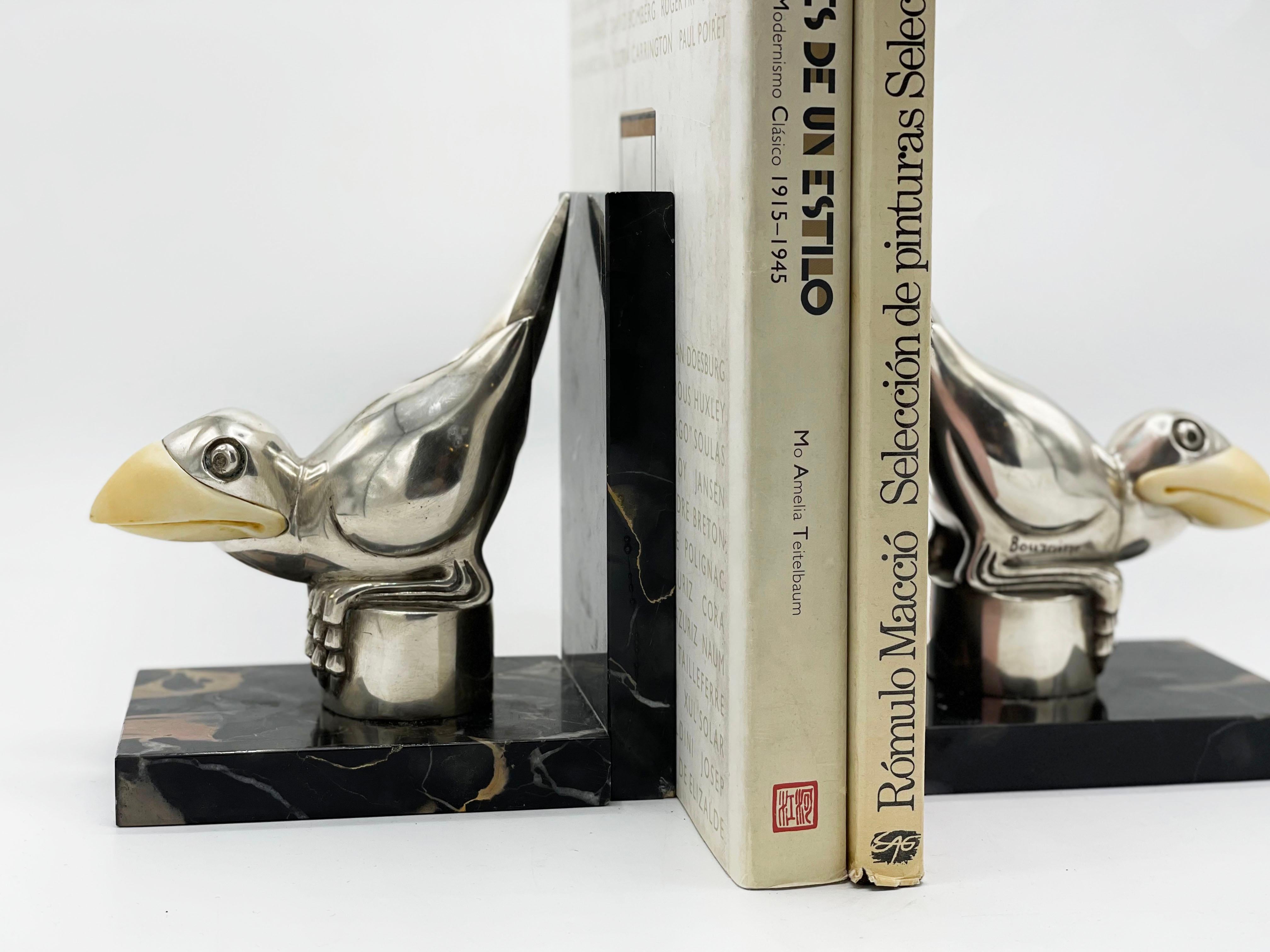Marcel Bouraine Art Deco Bronze Bird Bookends 1930s
These Art Deco bookends by Marcel Bouraine are playful pieces made of silvered bronze and mounted on Portoro marble. This charming Bird figure was also produced as a fancy automobile “mascot”, to