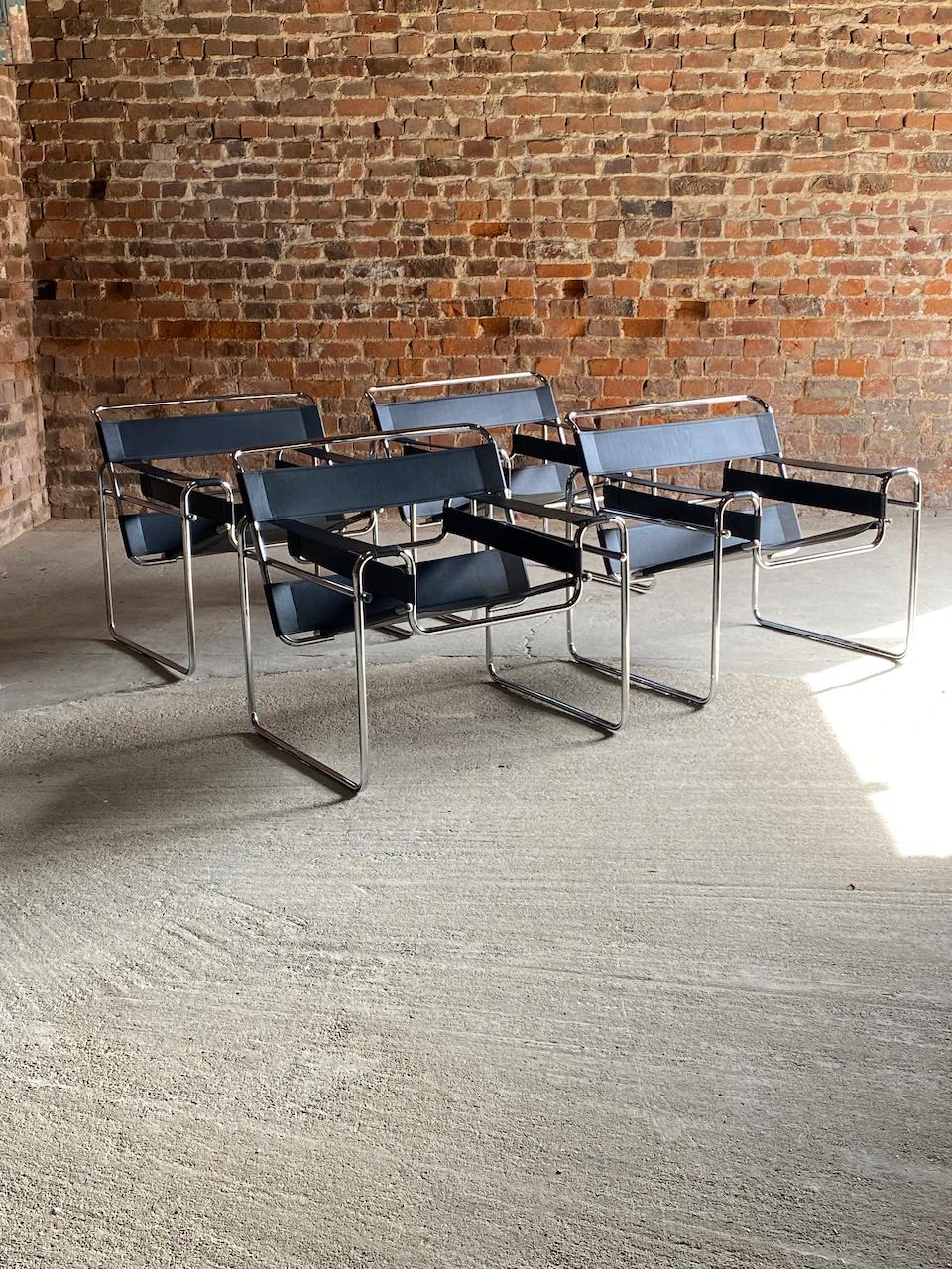 Marcel Breuer B3 Wassily Lounge Chairs Circa 1970

Magnificent set of four Marcel Breuer Wassily Lounge Chairs made in Italy possibly by Gavina circa 1970, the chairs with black leather strapping on a chrome tubular base, inspired by the frame of