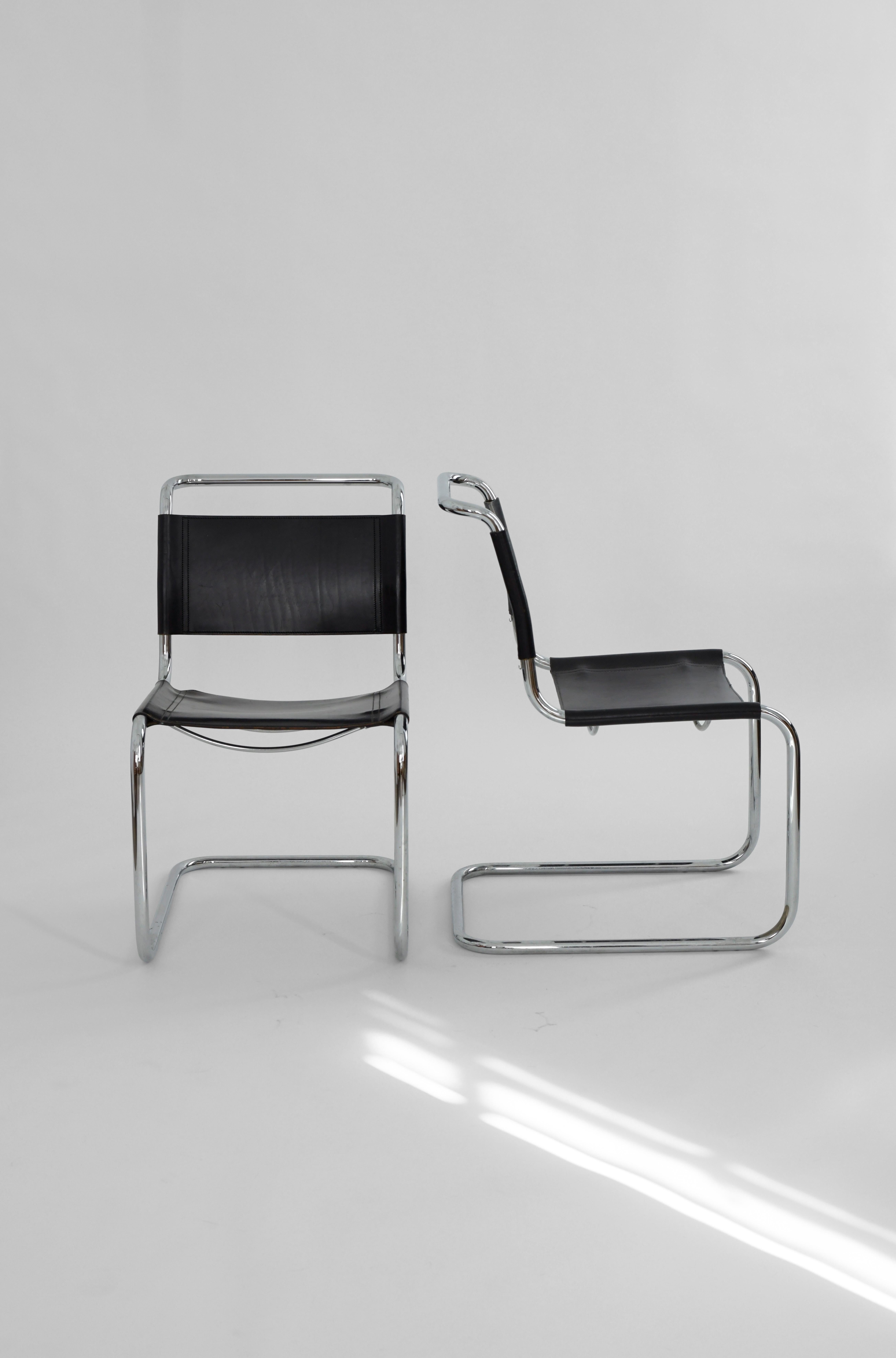 Pair of 1980s Marcel Breuer B33 chairs for Fasem. This iconic cantilevered design from the bauhaus is as comfortable as it is beautiful and still looks modern a century after their creation. 

This pair has a really nice age appropriate patina on