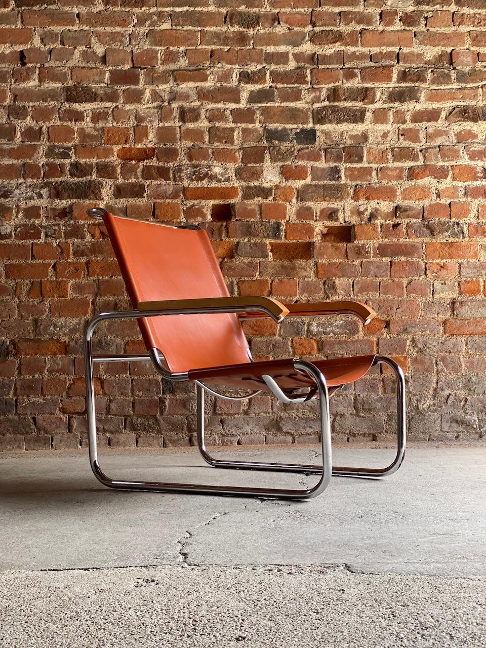 
Marcel Breuer B35 lounge chair by Thonet, circa 1930s 

Stunning Bauhaus design Marcel Breuer B35 armchair by Thonet circa 1930s, the cantilever frame with original tan leather seat, wooden armrests with a chromed tubular steel frame, a classic