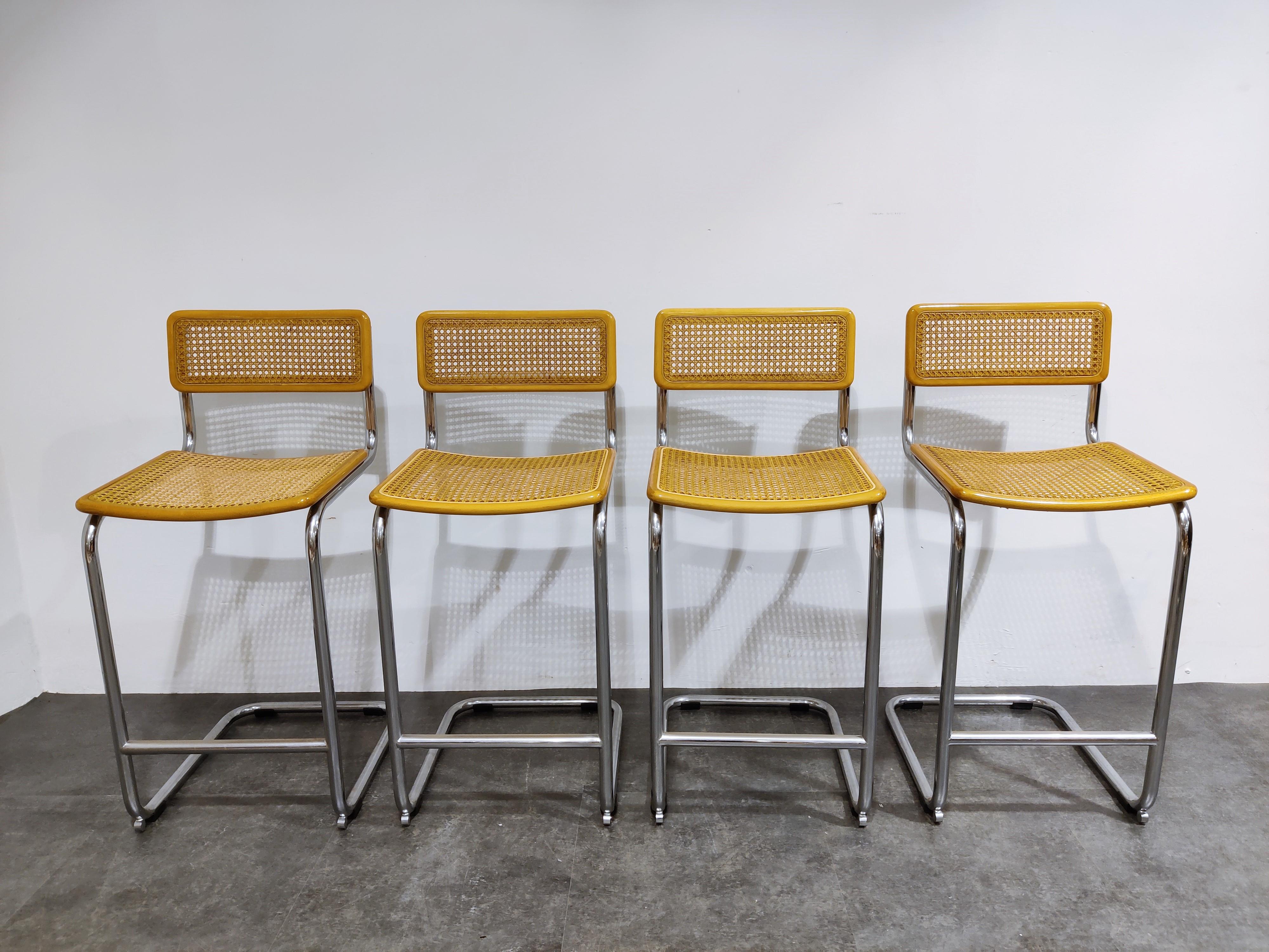 Set of 4 Marcel Breuer Bauhaus design bar stools produced by Cidue (labelled).

Tubular chrome frame with cane seats.

All in very good condition.

Dimensions:
Height: 93cm/36.61