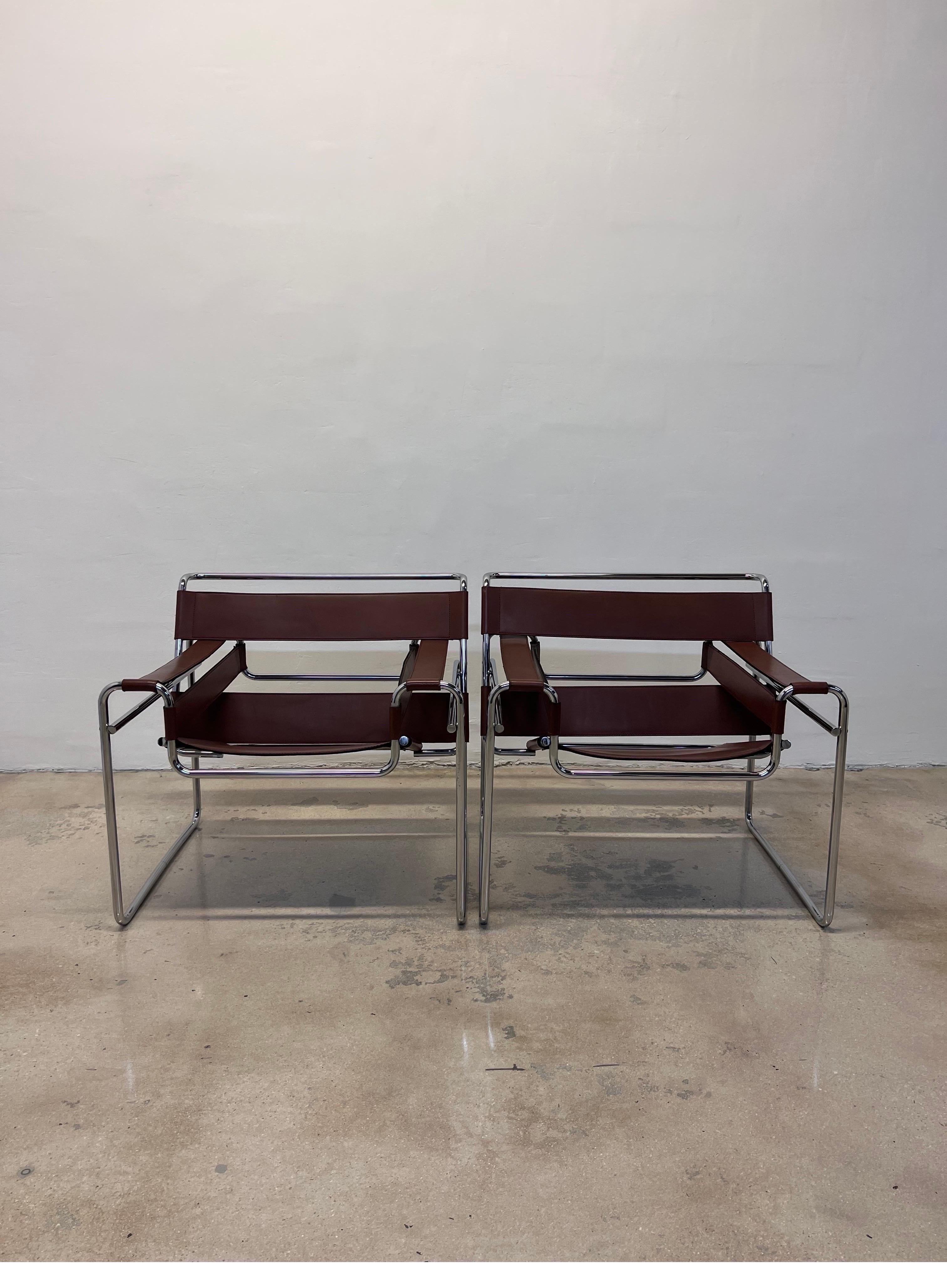 Distressed brown leather and tubular chrome Wassily lounge chairs by Marcel Breuer for Gavina Spa and sold by Knoll International circa 1960s.