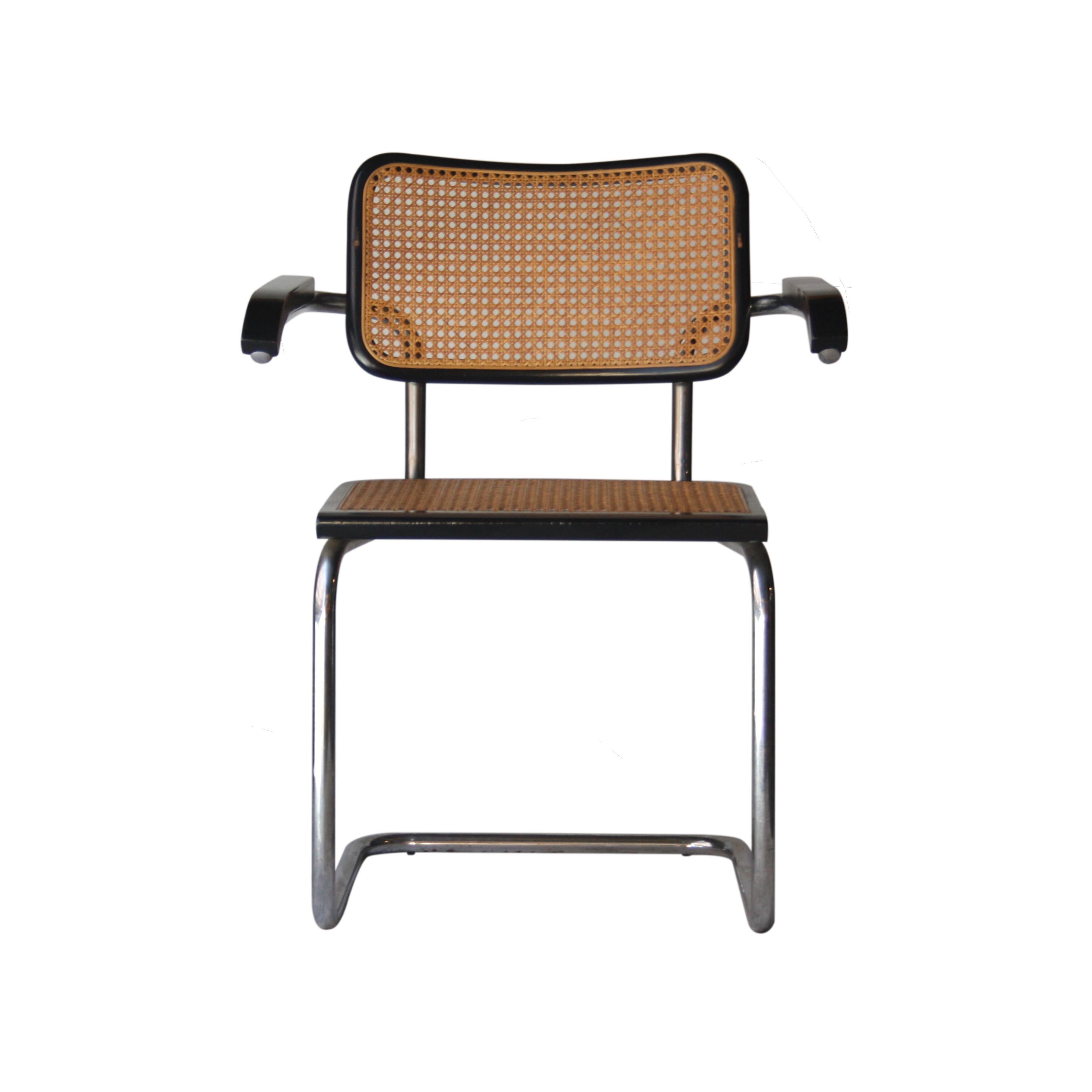 Set of 4 Cesca chairs designed by Marcel Breuer in 1962 and produced in Italy during de 1960s by Gavina. Chromed tubular structure, black lacquered wood frame with braided natural fiber seat and back.