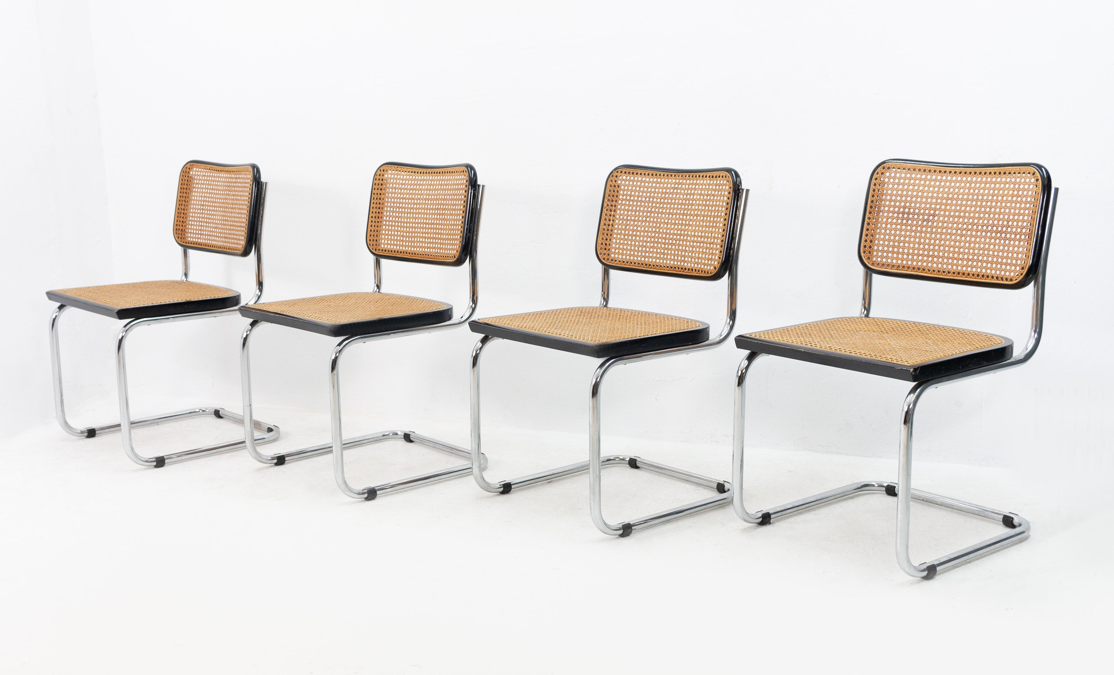 Four vintage iconic Marcel Breuer Cesca chairs, made in Italy, 1970s. Signed with a sticker 