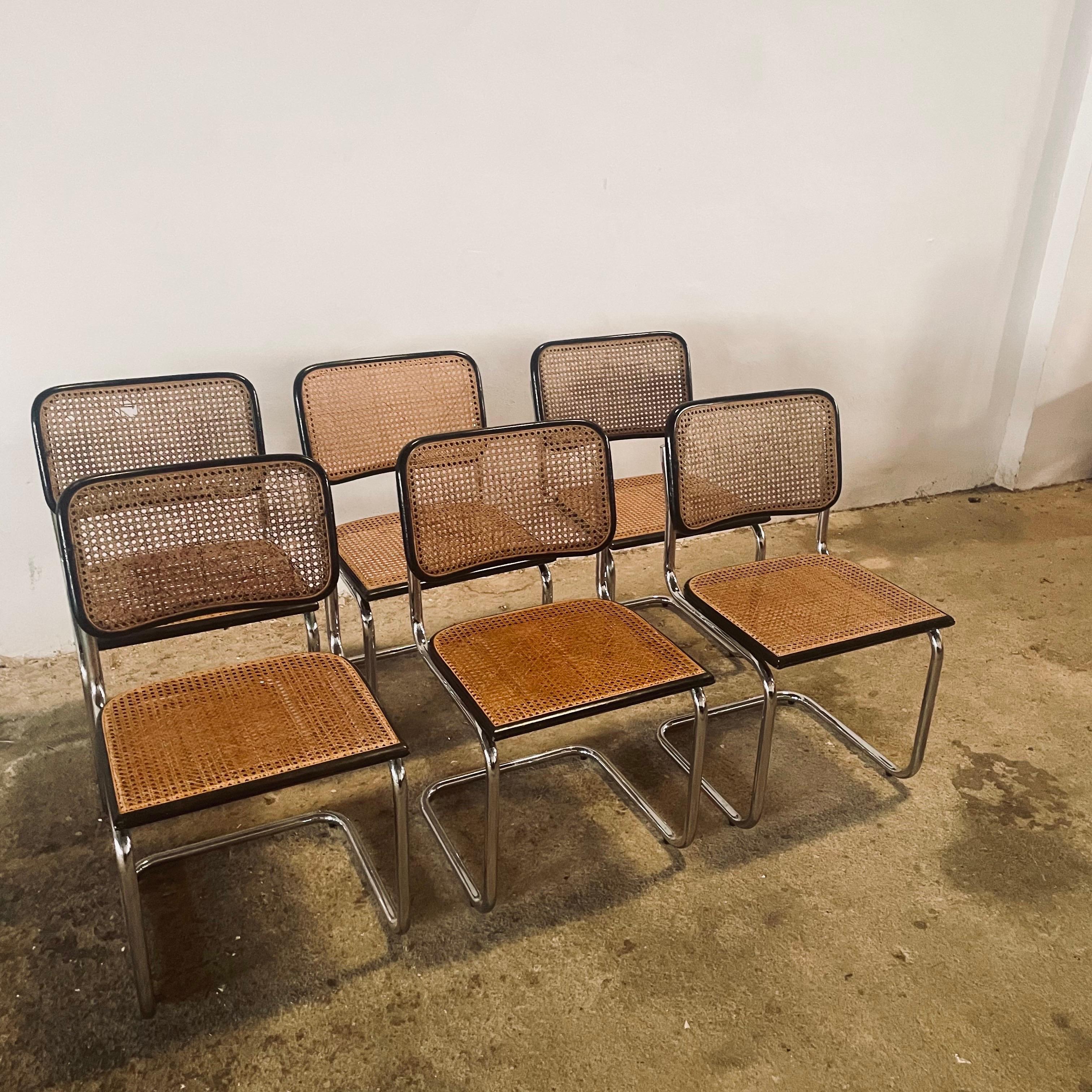Step into the world of iconic Modernist design with these timeless Cesca chairs (Model B32) - a masterpiece created by the legendary Marcel Breuer during his Bauhaus period. First designed in 1928 and named after his daughter Francesca, these chairs