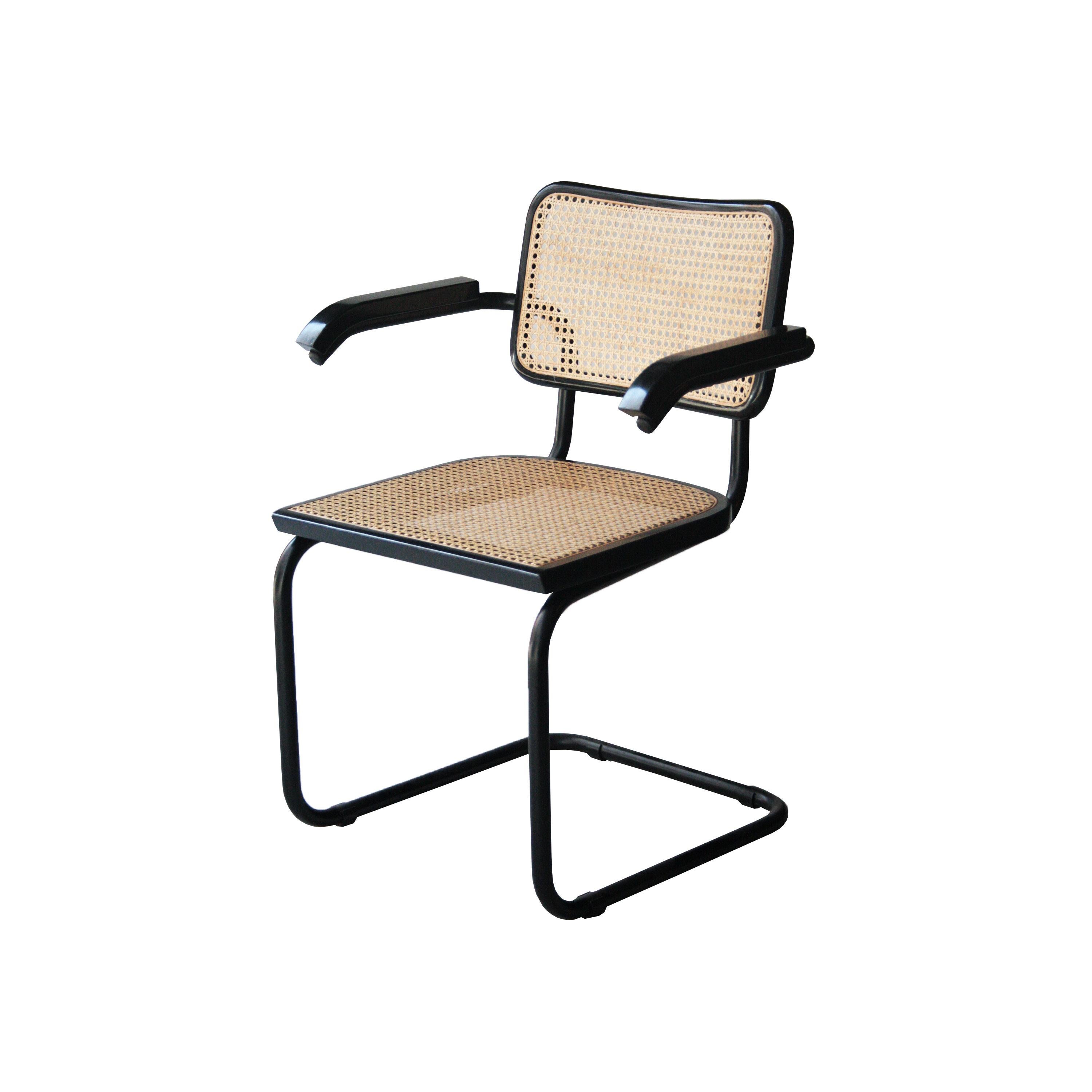 Chairs model B64, Cesca designed by Marcel Breuer (1902-1981). With structure made of tubular steel lacquered in black, seat and back in wicker and wood lacquered in black. German design originated in 1927 and produced by Gavina in Italy from 1962.