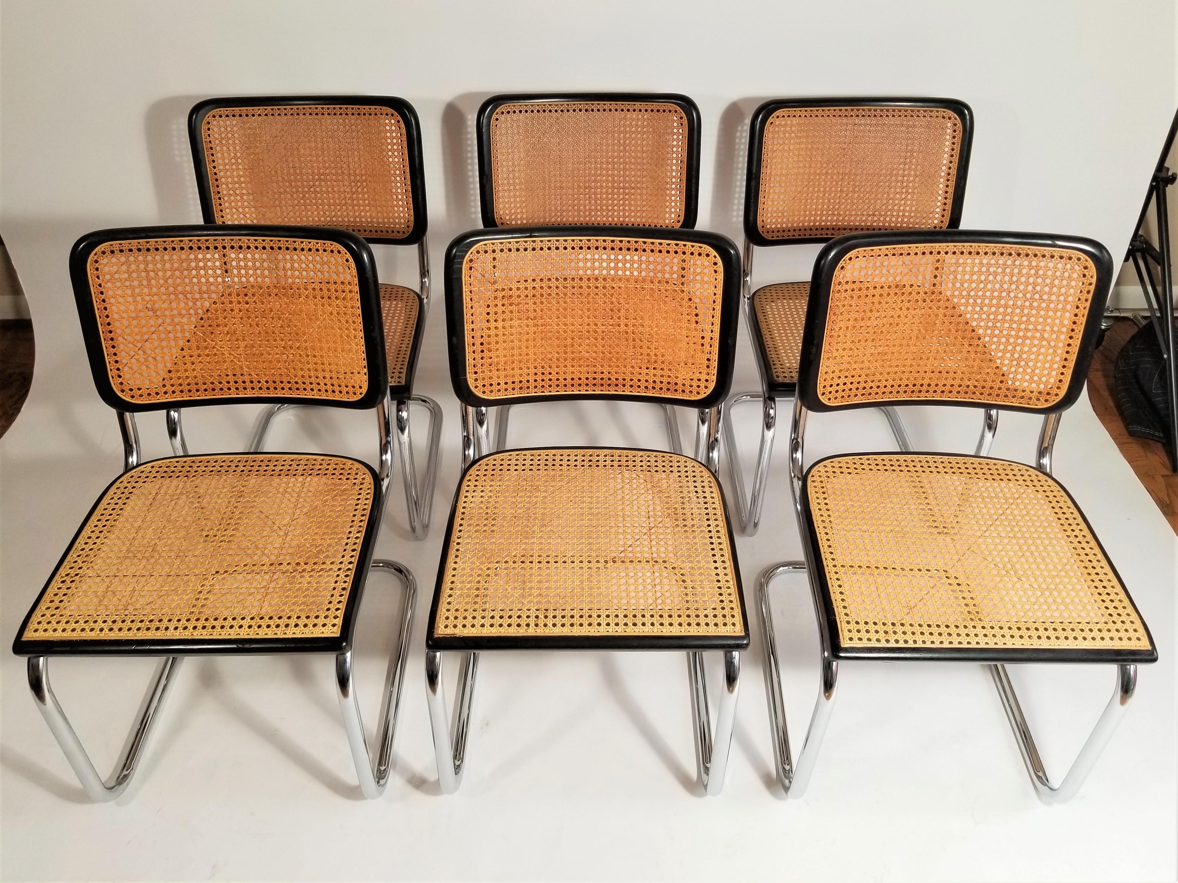 Midcentury set of 6 Black Marcel Breuer Cesca side chairs. Cane back and seats with Black finish. Classic steel chrome frames. Good to excellent condition. All cane is intact. Rare to find matching set where all chairs are in this good of