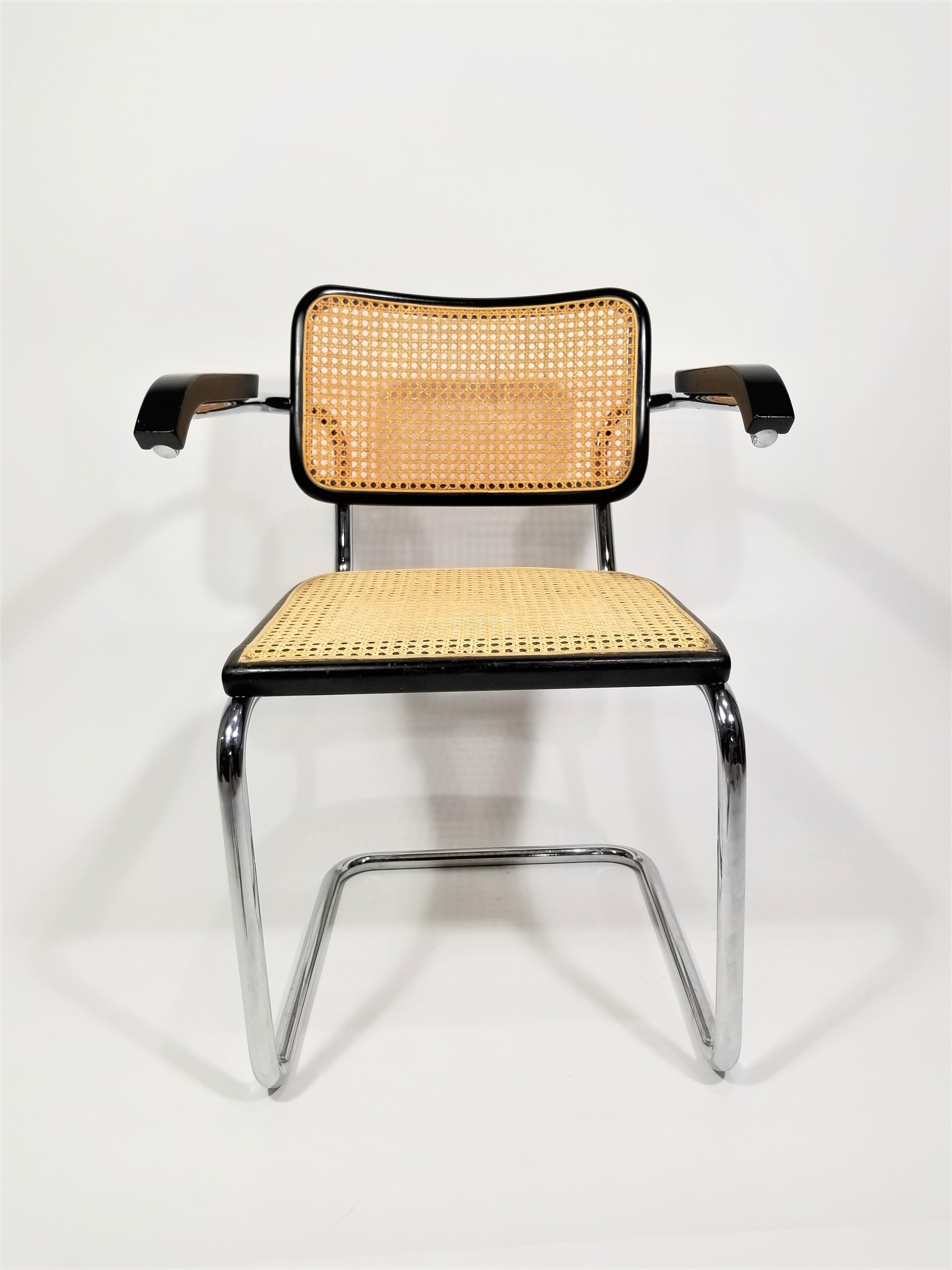 Mid century 1960s black Marcel Breuer Cesca armchair. Black finish. Cane back and Seat. Caning is intact. Classic chrome cantilever frame. We polish all chrome. 

Complimentary free local delivery can be arranged for this item in NYC and
