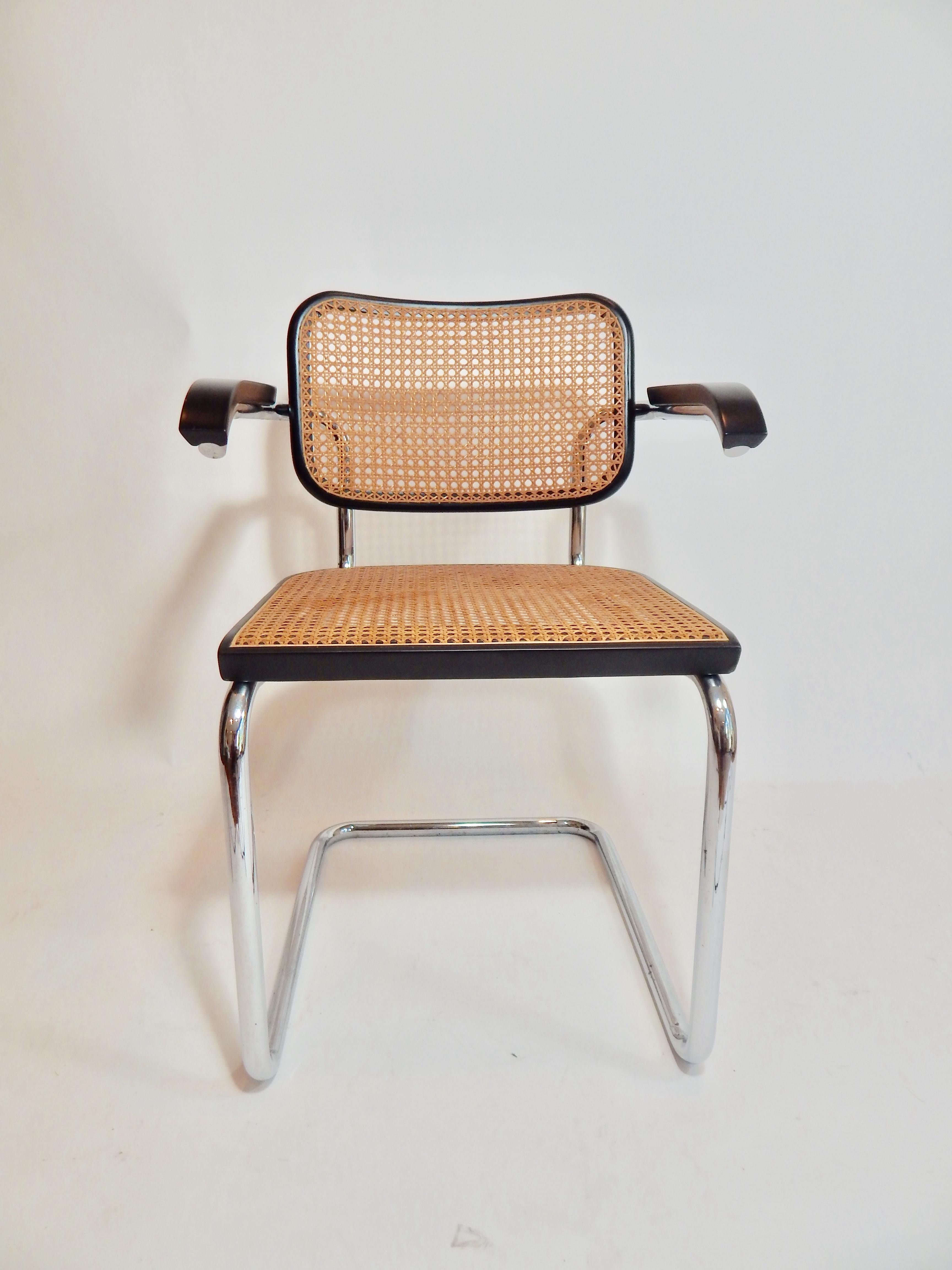 Midcentury 1970s Marcel Breuer Cesca armchair produced by Knoll. Very good condition with exception of exhibiting some minor blemishes.