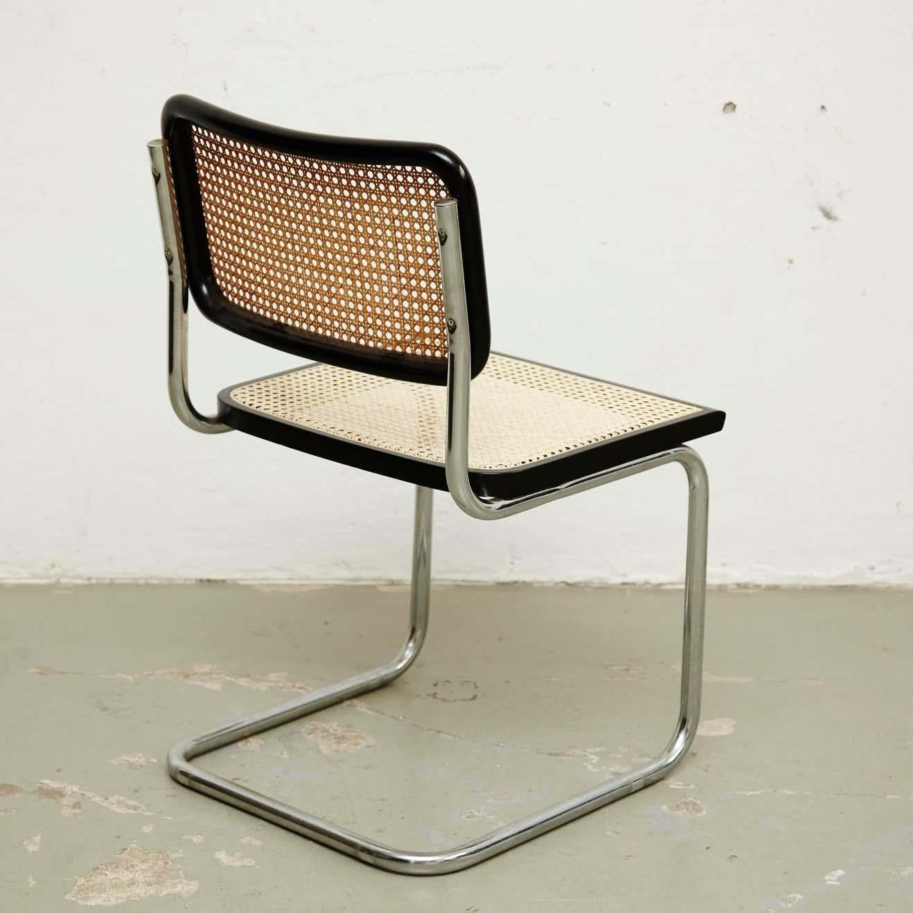 Chair, model Cesca, designed by Marcel Breuer around 1970, manufactured in Italy.
Metal pipe frame, wood seat and back structure and rattan.

 In good condition, with minor wear consistent with age and use, preserving a beautiful patina. The seat