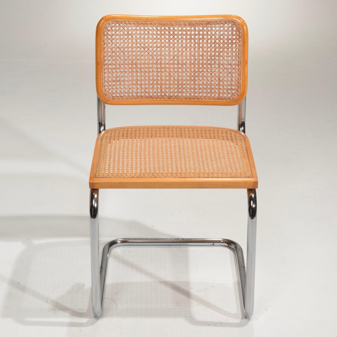 Marcel Breuer Cesca side chairs in natural finish. Cane seats and backs. Classic chrome cantilever frames.