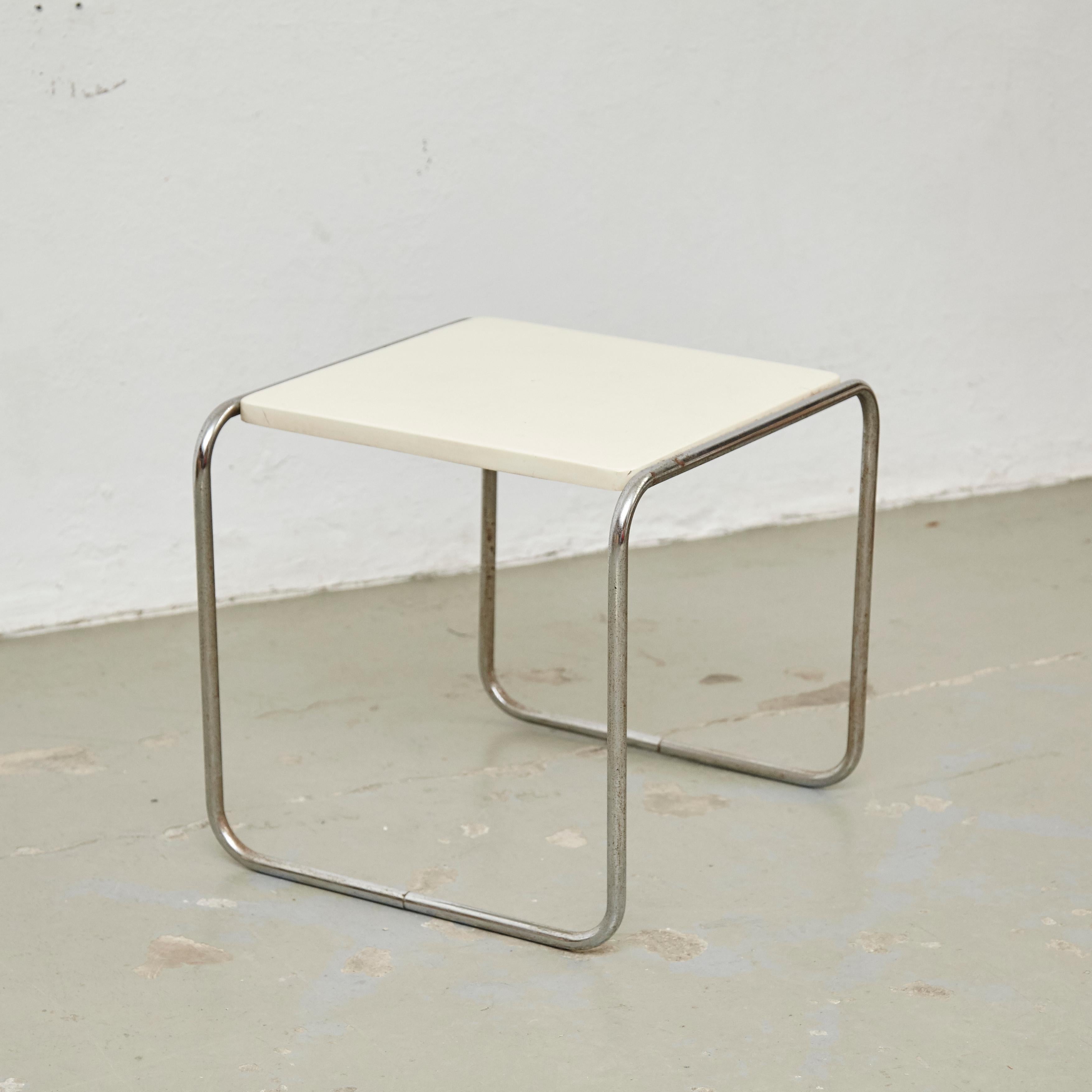Table designed by Marcel Breuer in early 20th.
By unknown manufacturer, Germany, circa 1960.

In original condition, with minor wear consistent with age and use, preserving a beautiful patina.

Materials:
White Lacquered