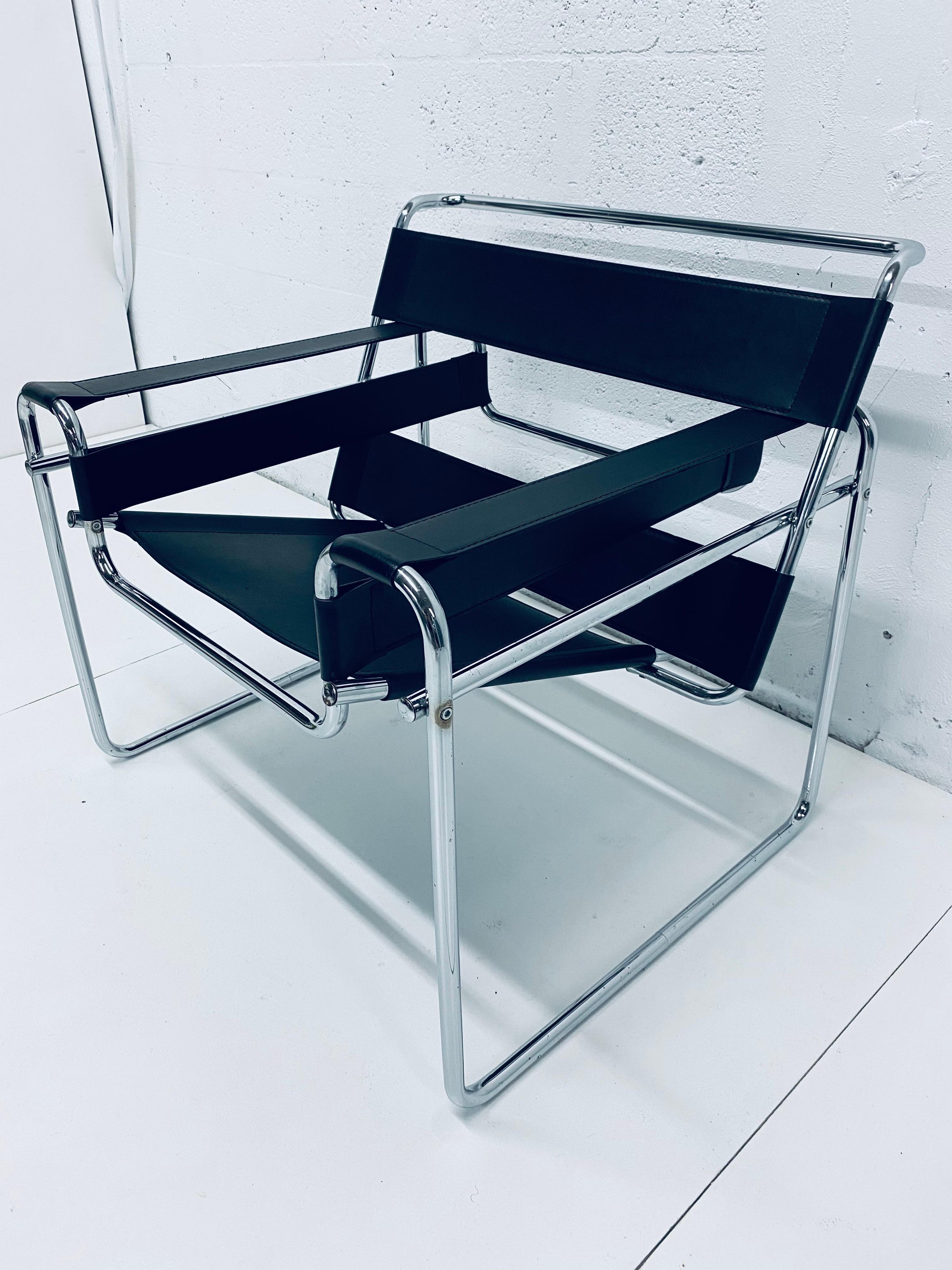 Black leather and chrome armchair using the original design of Marcel Breuer. Stamped 