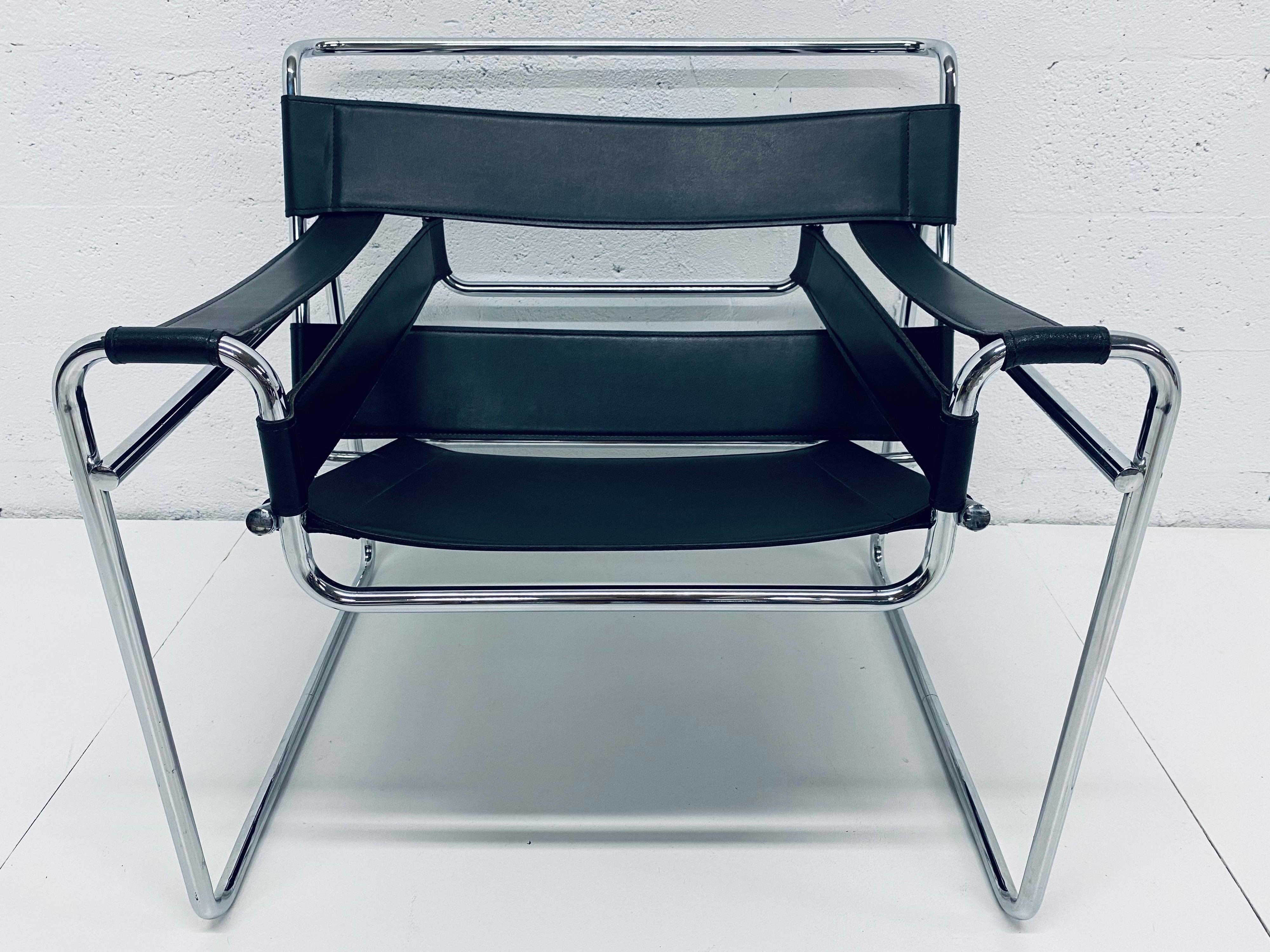 Black leather and chrome armchair using the original design of Marcel Breuer. Manufacturer unknown. That Galerie also has a white and black Wassily chair in our other listings.