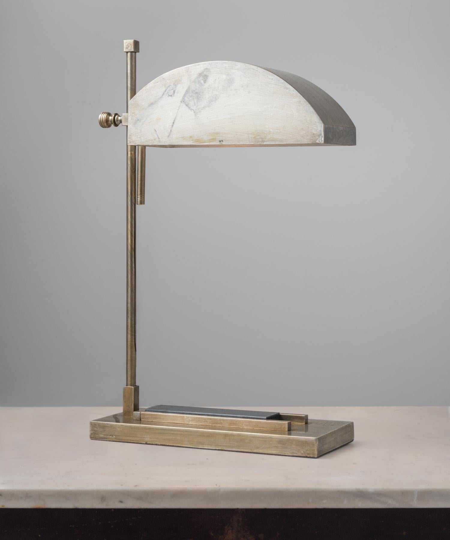 Marcel Breuer Desk Lamp, Germany, circa 1925

Created for the International Exposition of Modern Industrial and Decorative Arts in Paris. Brass-plated nickel and stamped 