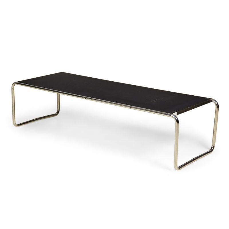American International-Style (circa 1924) 'Laccio' coffee table with a gloss black mica rectangular top supported on a chrome plated steel tube frame. (MARCEL BREUER FOR GAVINA UNDER LICENSE FROM KNOLL INTERNATIONAL)(similar table in white: