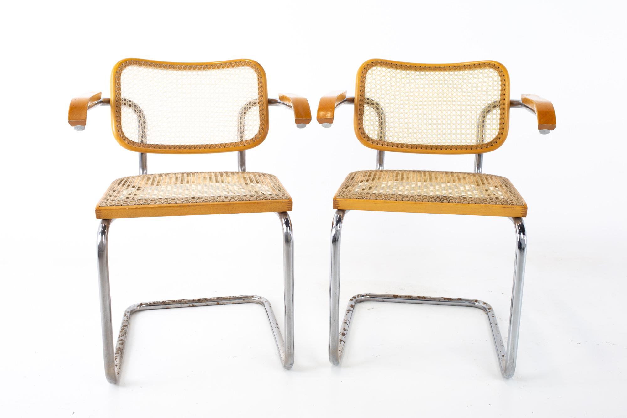 Marcel Breuer for Stendig B64 style Mid Century chrome and cane dining chair - pair
Each chair measures: 23 wide x 22 deep x 30 high, with a seat height of 18 inches

All pieces of furniture can be had in what we call restored vintage condition.