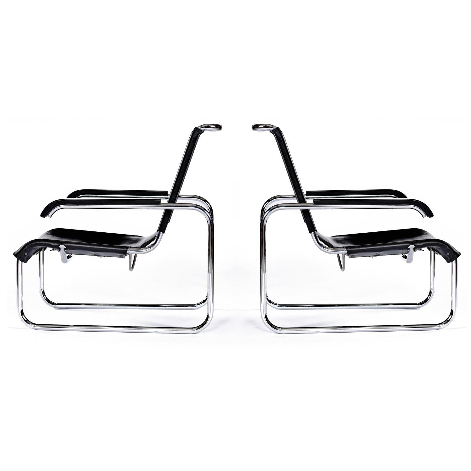 Handsome set of mid-century modern cantilever black leather lounge chairs designed by Marcel Breuer for Thonet.  These model B35 armchairs demonstrate a European Modern Bauhaus discipline that will keep them forever timeless.  The tubular chromed
