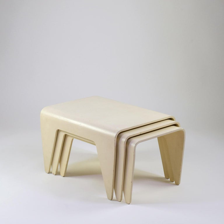 Marcel Breuer (Designer), Hungary
Isokon (manufacturer), London UK

'Isokon Nesting Tables', designed 1936.

Set of three nesting tables.
Cream-white lacquered plywood.

Stunning rare set in good original condition.
The white lacquered